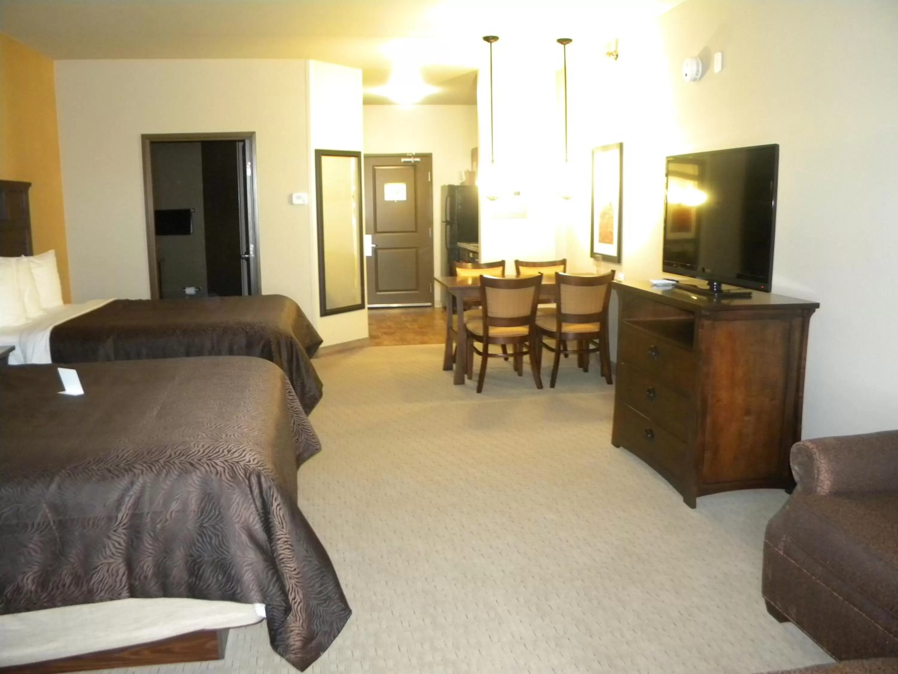 Bed in Teddy's Residential Suites Watford City