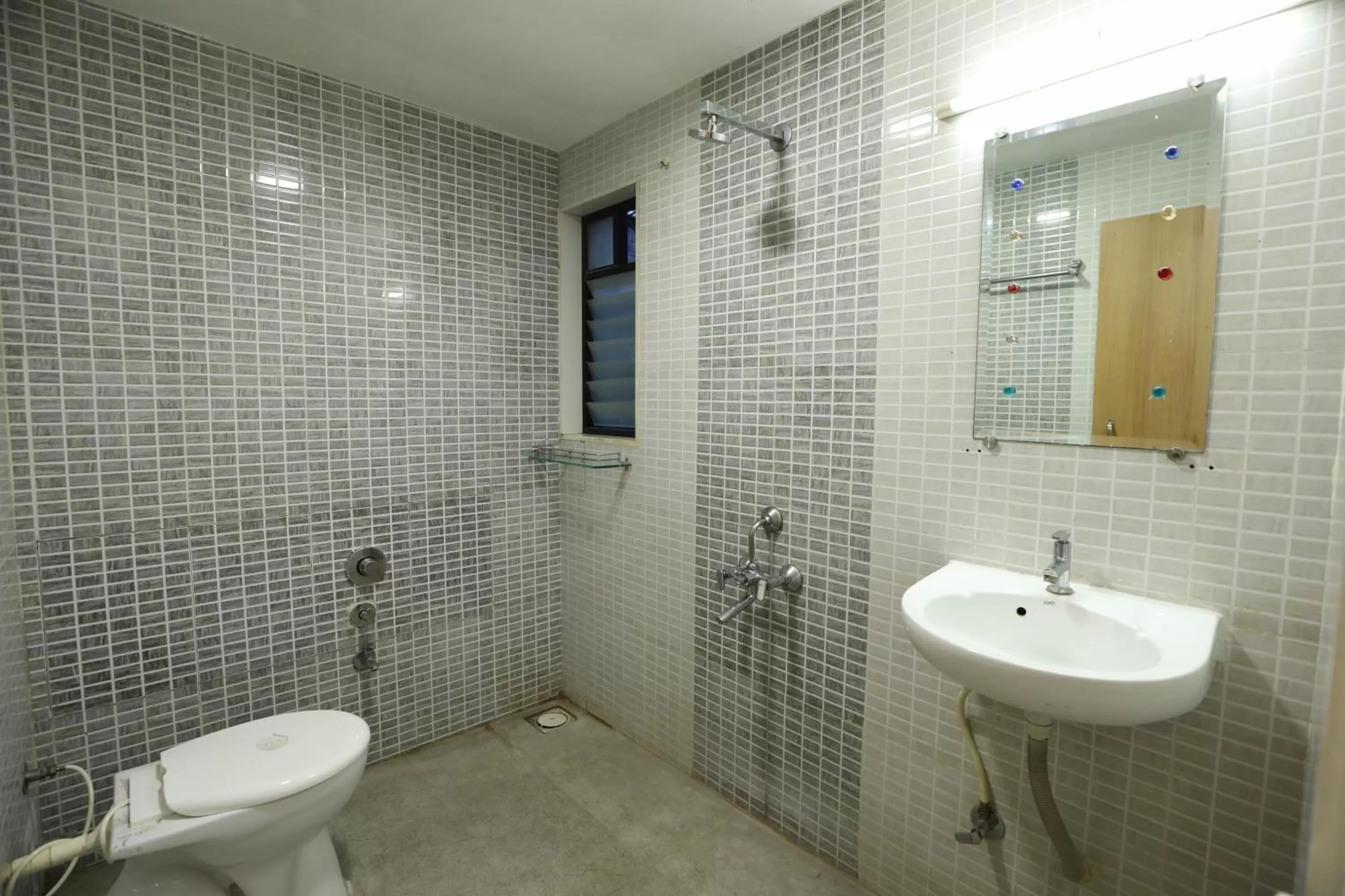 Bathroom in Hotel Shagun, Piplod City Centre Surat