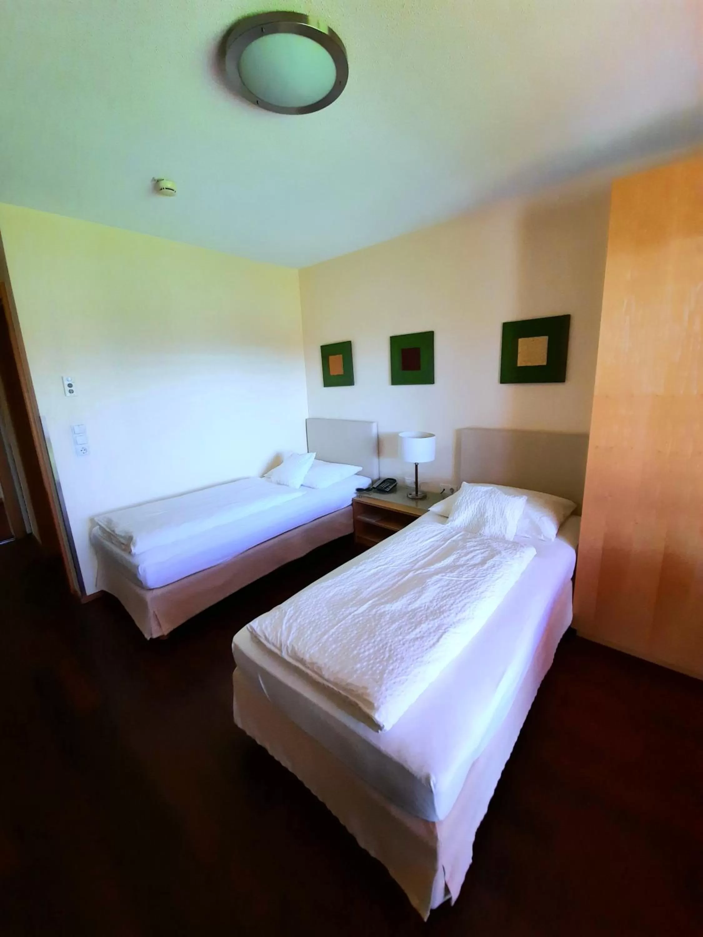 Bed in Das smarte Hotel garni