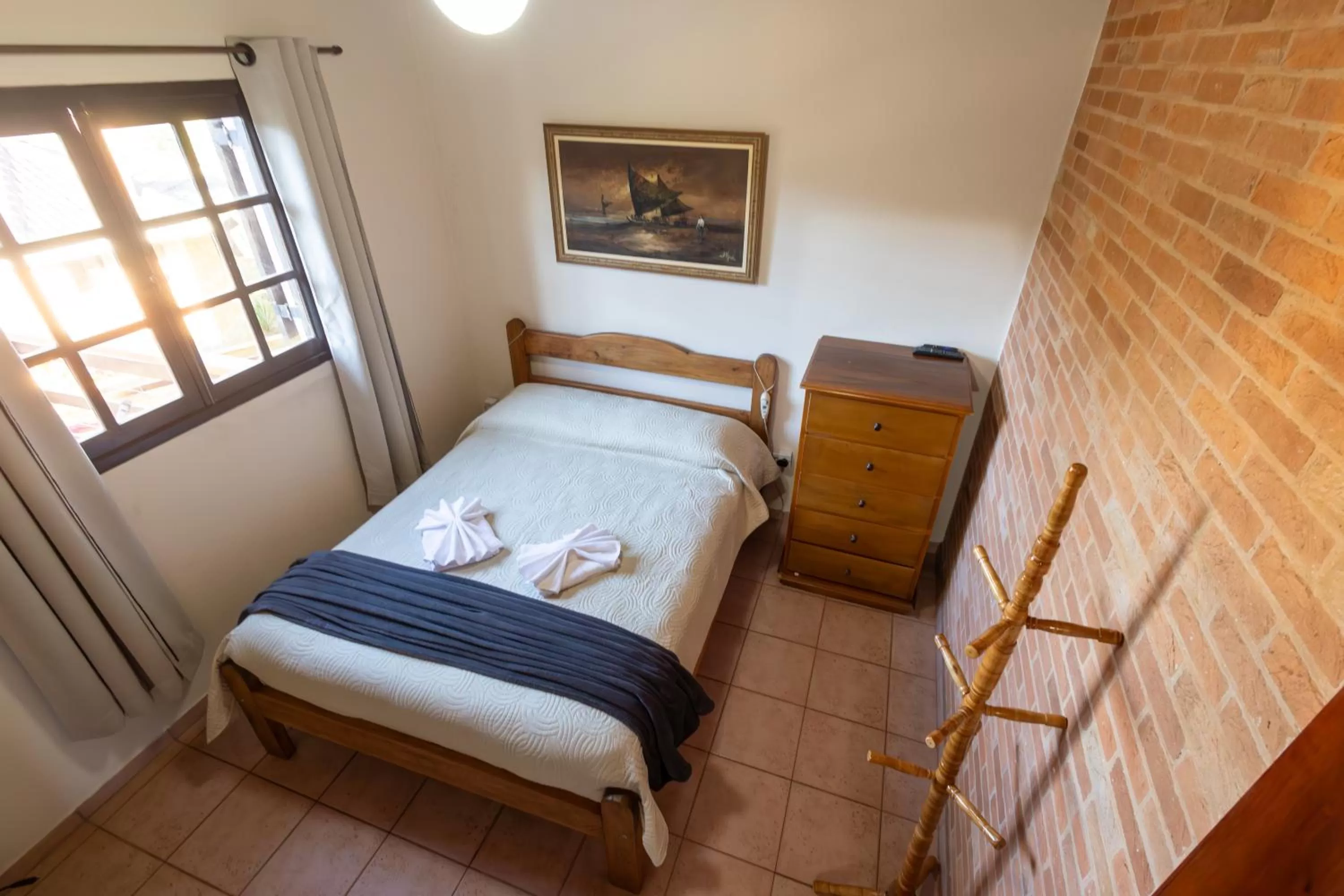 Bed in Chalés 3 Pinheiros