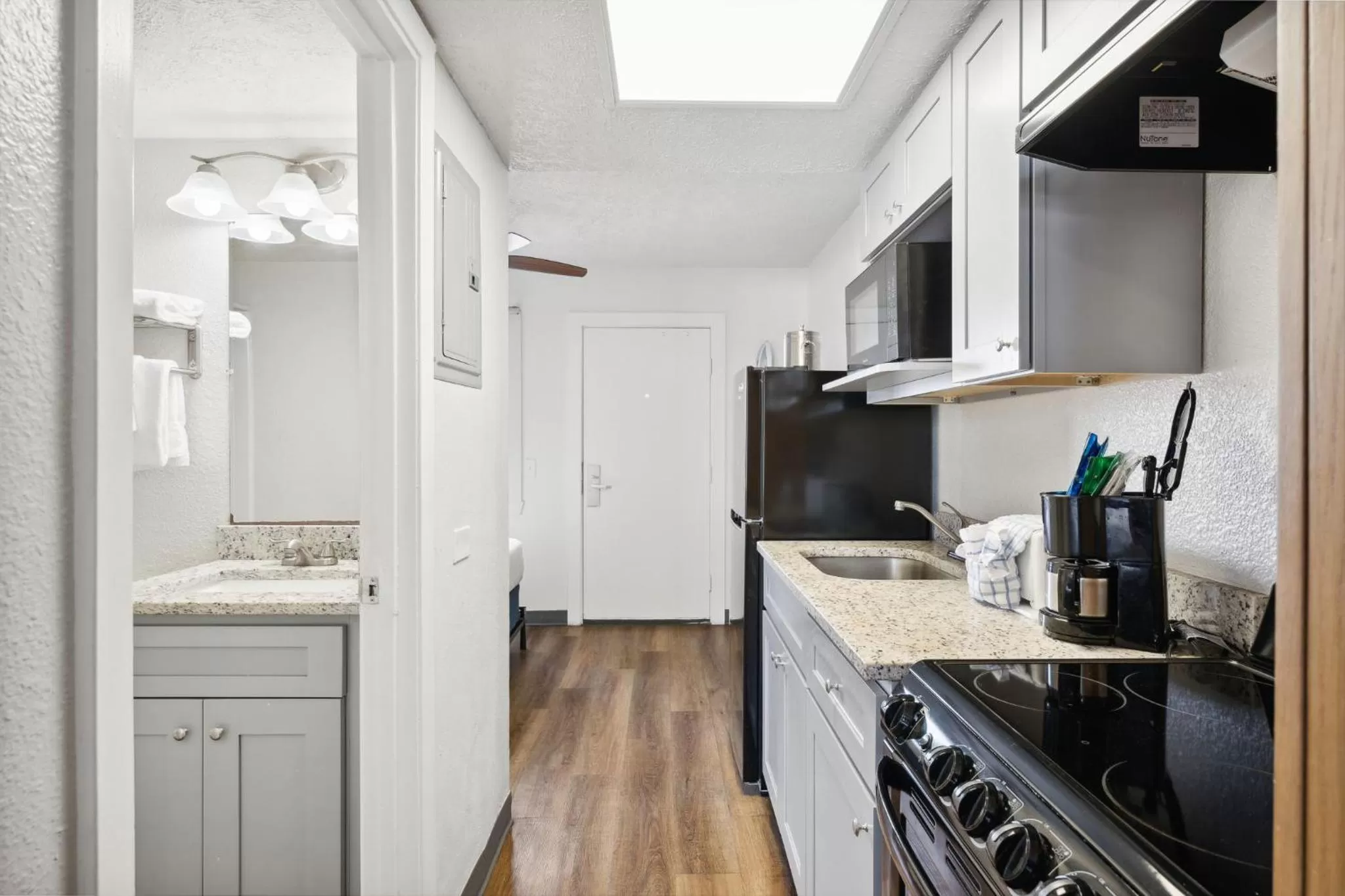 kitchen in Sugar Sands Beachfront Hotel, a By The Sea Resort