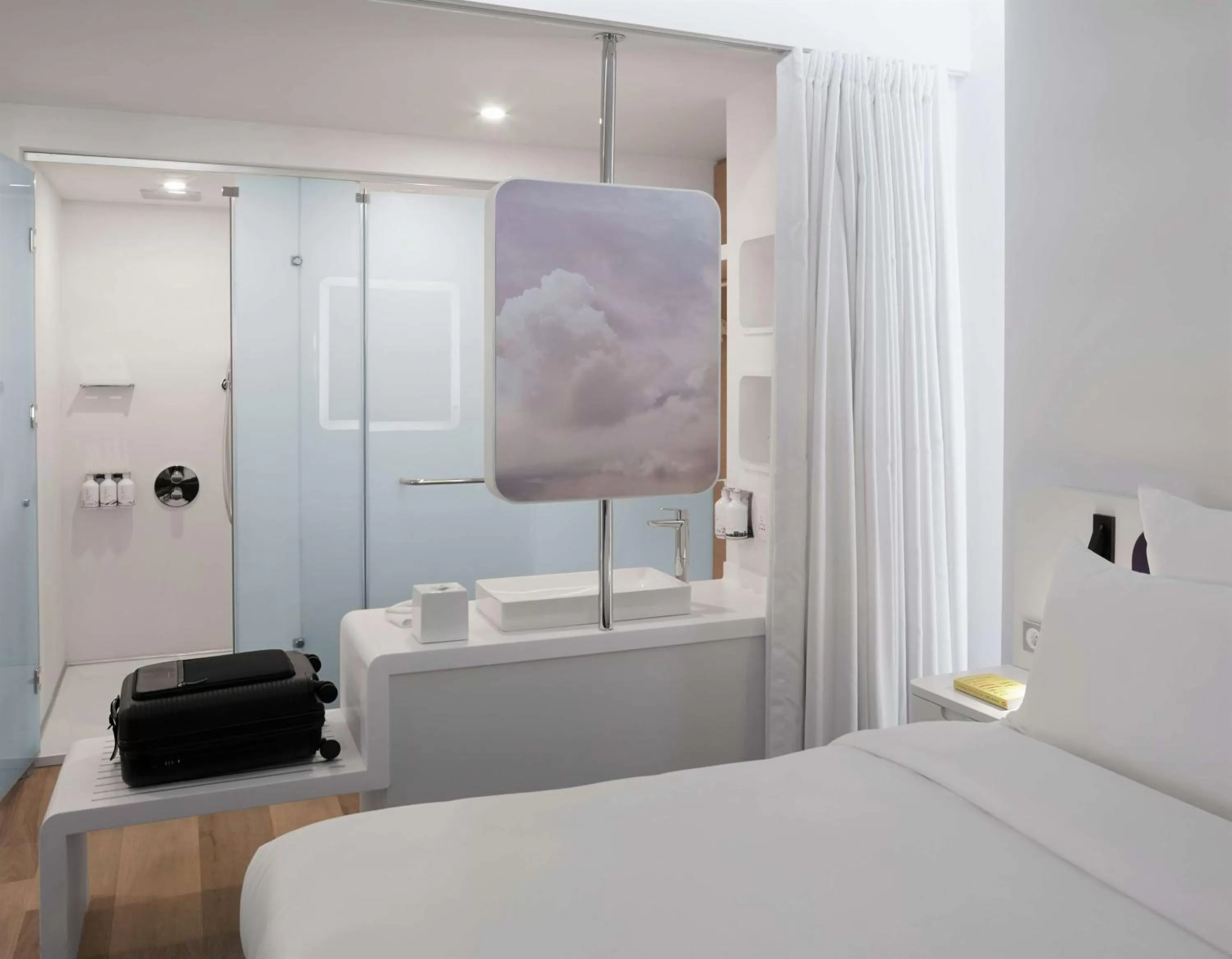 Bathroom, Bed in YOTELAIR Istanbul Airport, Duty free - International Transit area