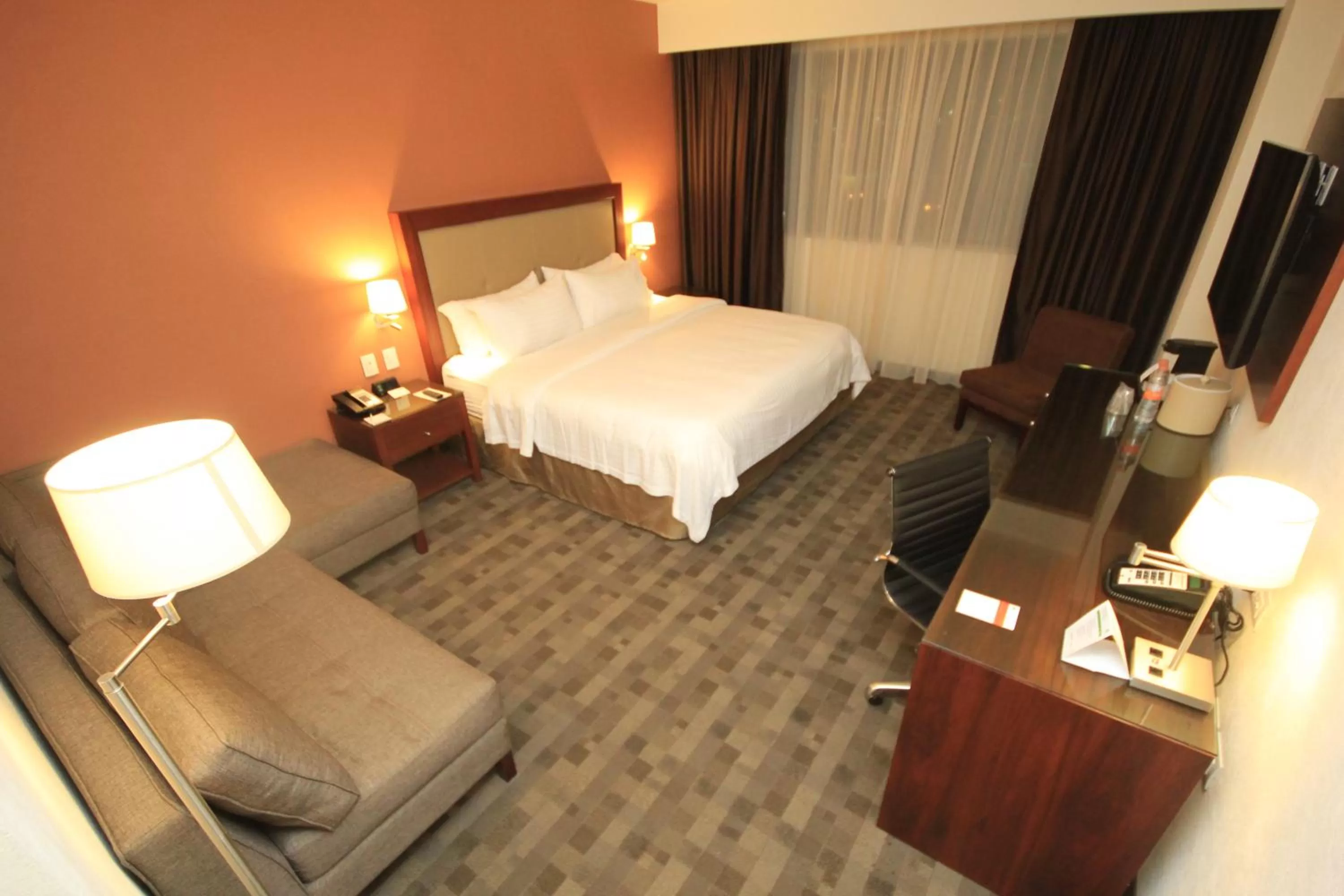 Photo of the whole room, Bed in Holiday Inn & Suites Plaza Mayor by IHG