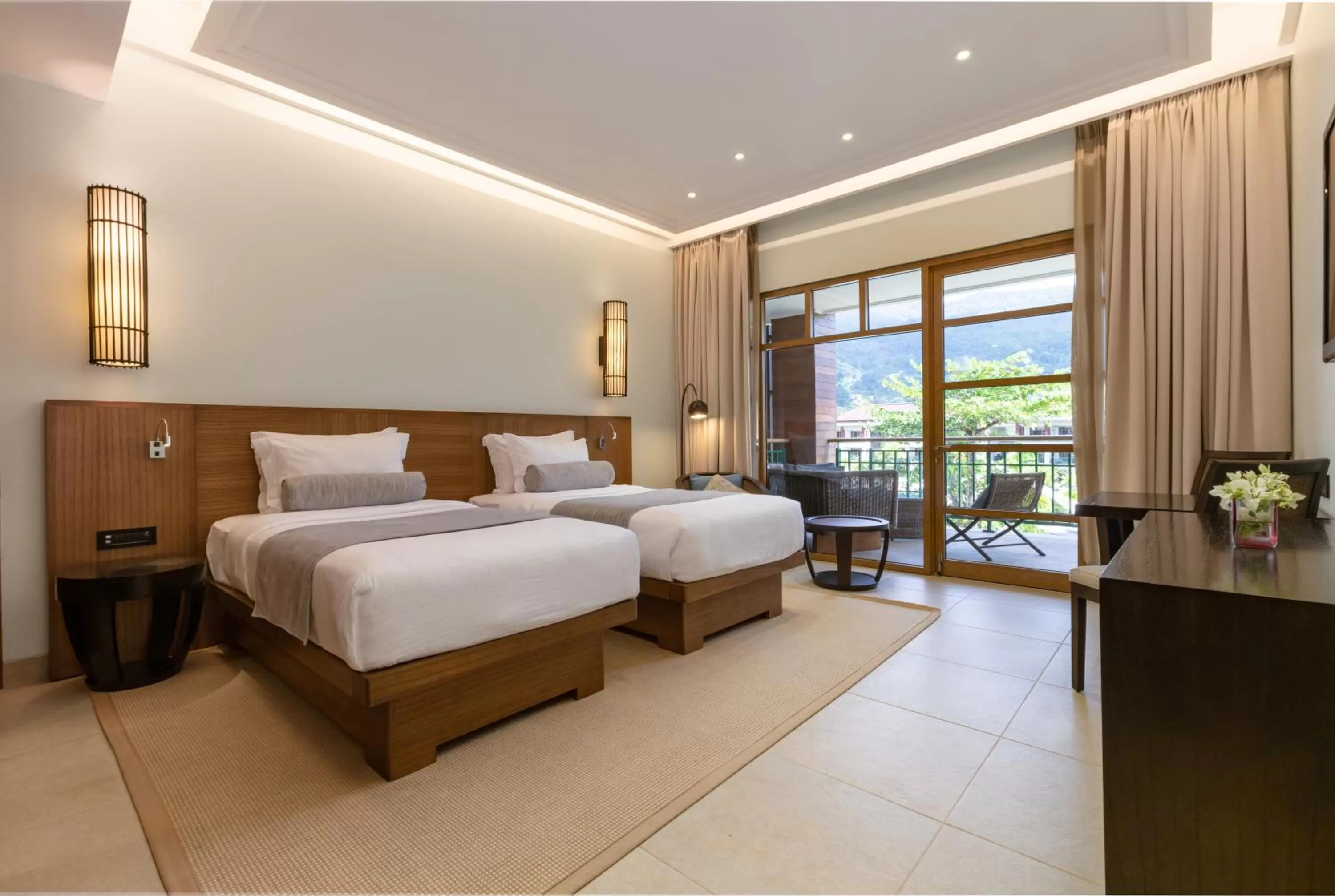 Bed in Savoy Seychelles Resort & Spa