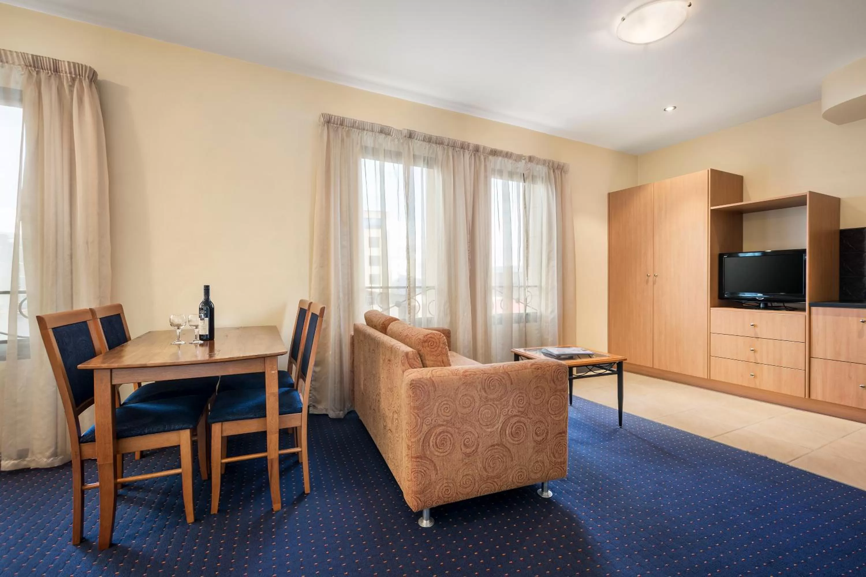 Living room in Quest Savoy