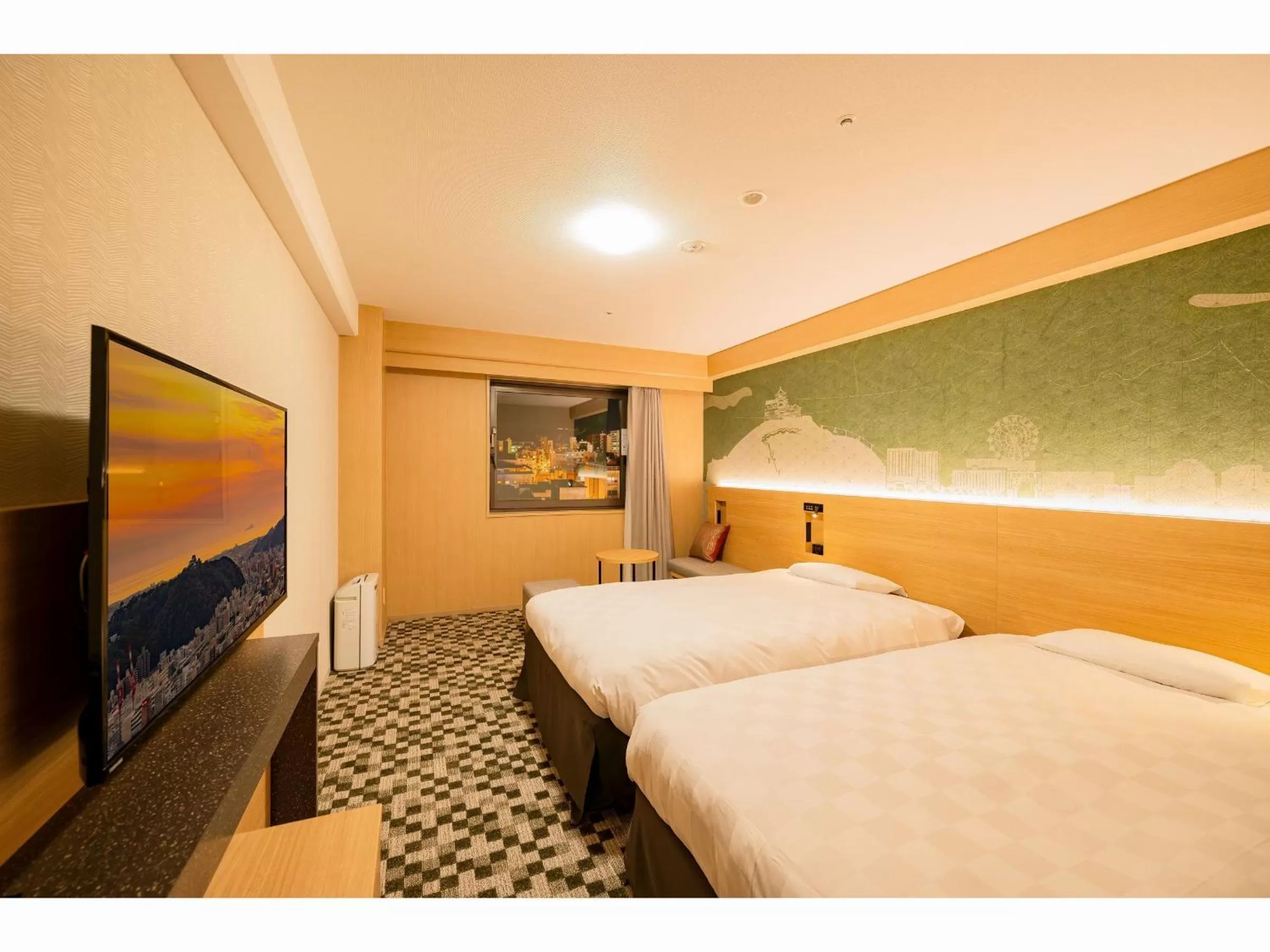 Bed in Matsuyama Tokyu REI Hotel