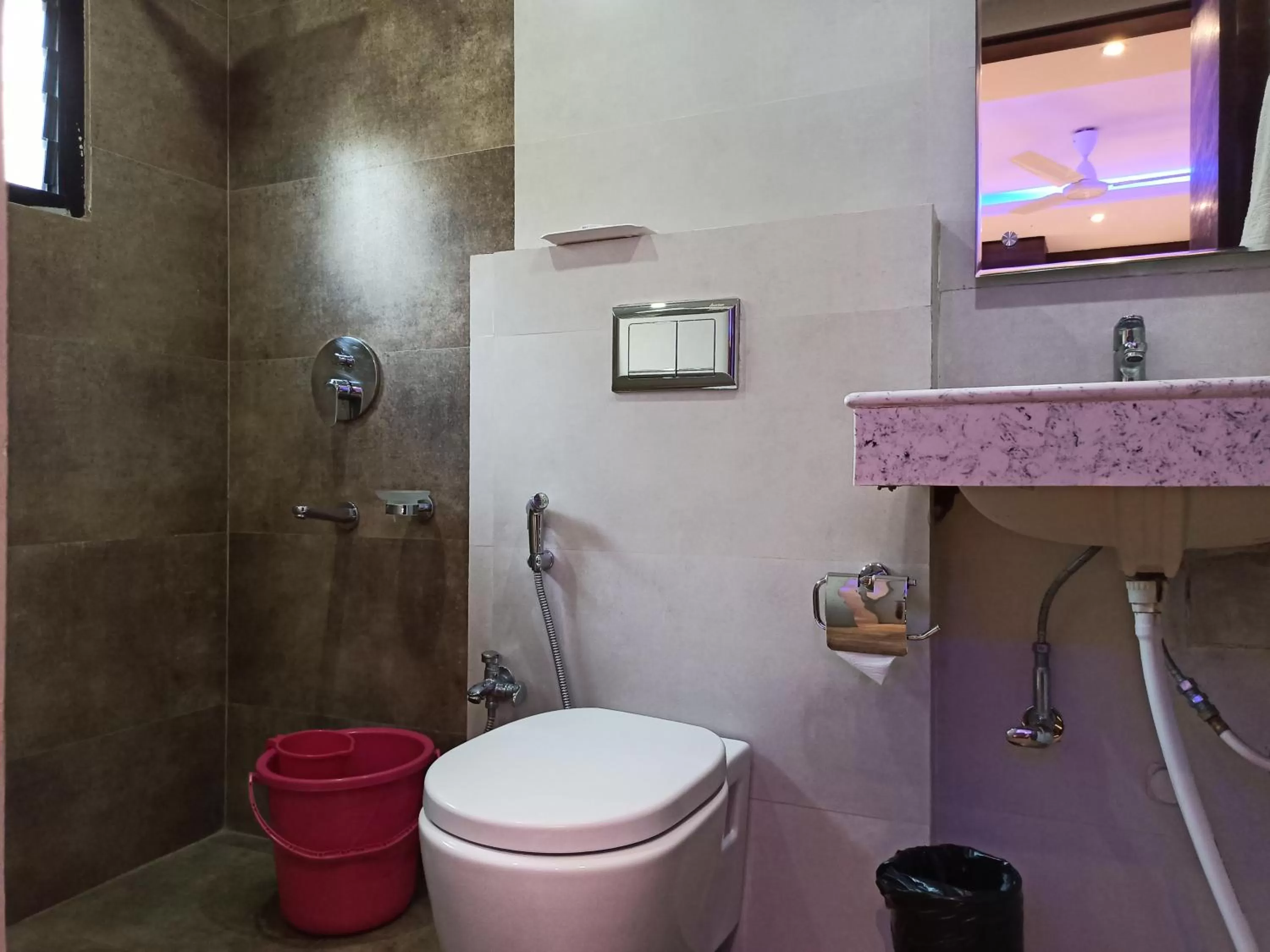 Bathroom in Hotel A P Home's - A Boutique Hotel