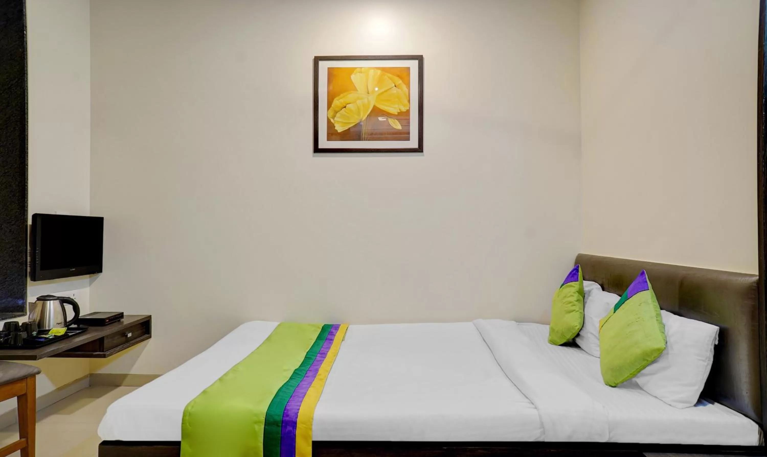 Bedroom, Bed in Treebo Bhagyashree Executive