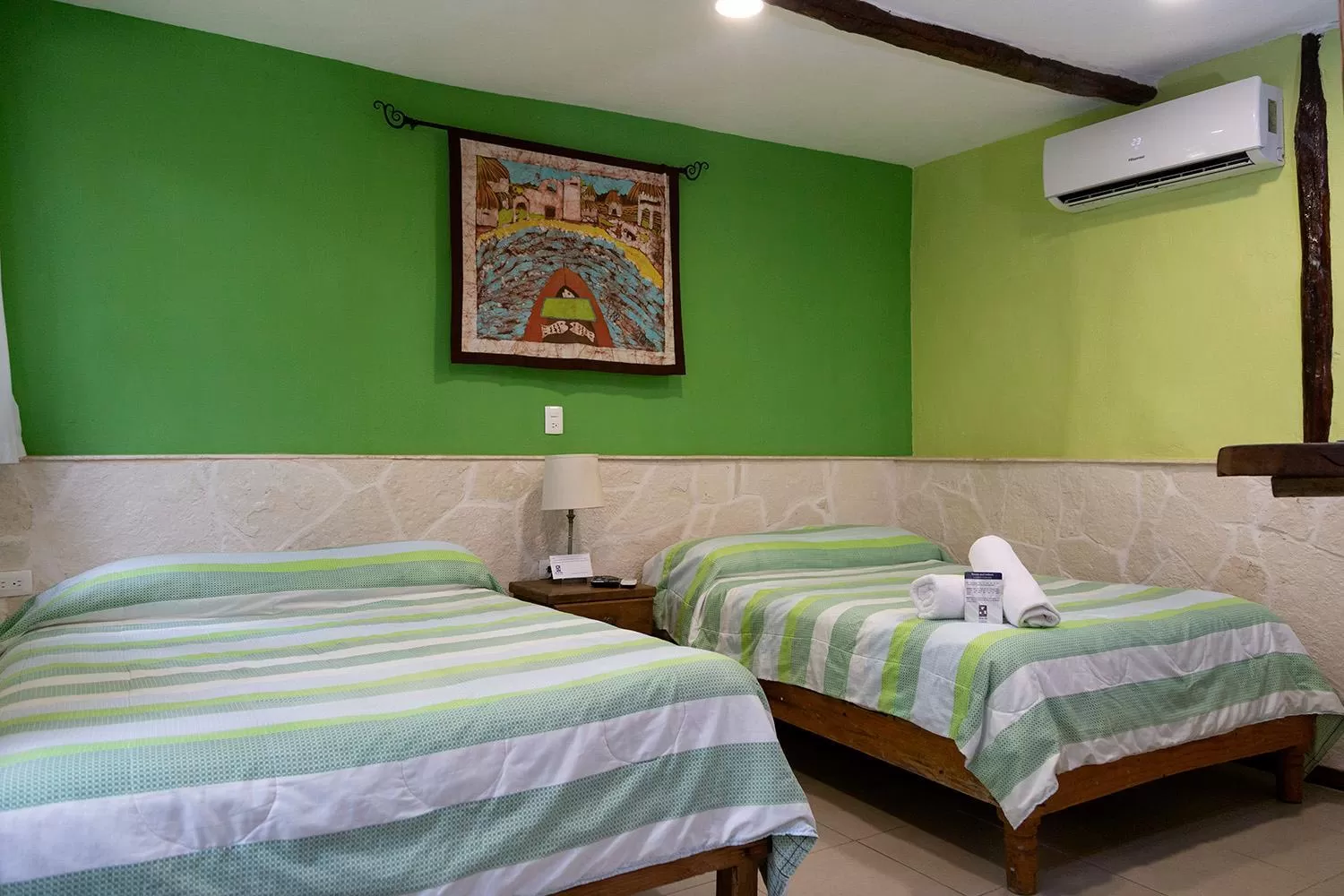 Bed in Hotel Amar Inn