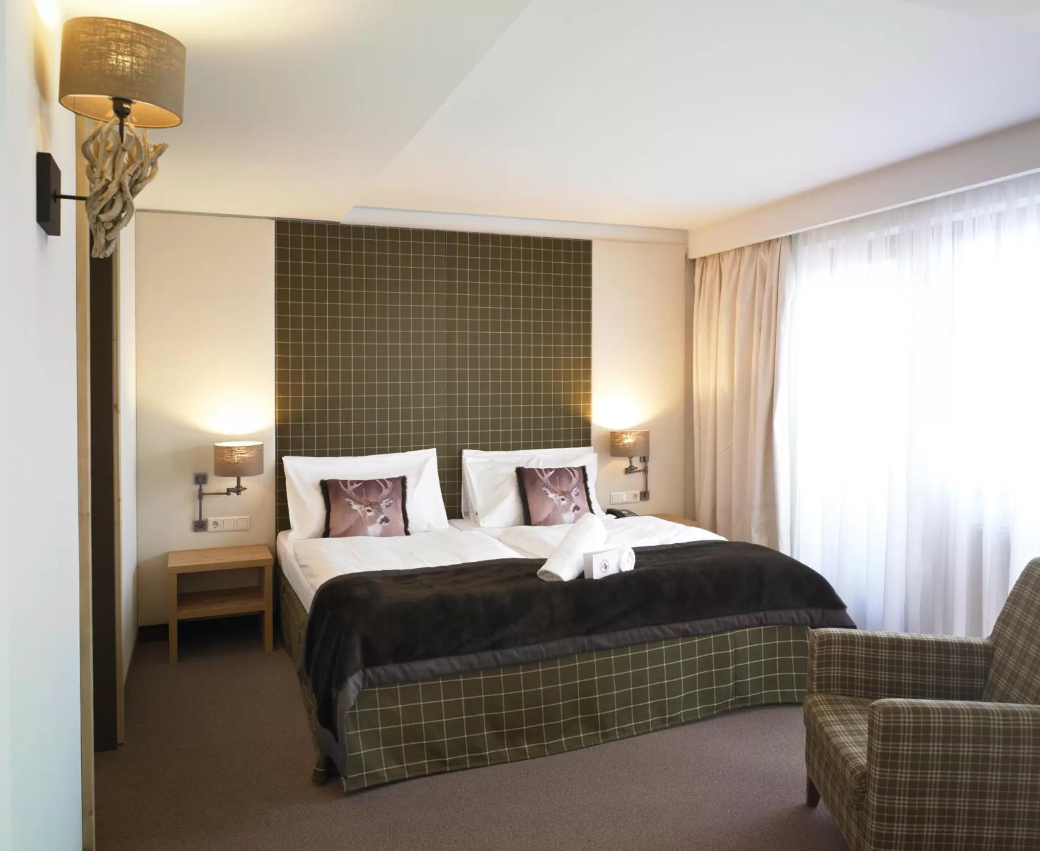 Photo of the whole room, Bed in Das Alpenhaus Kaprun