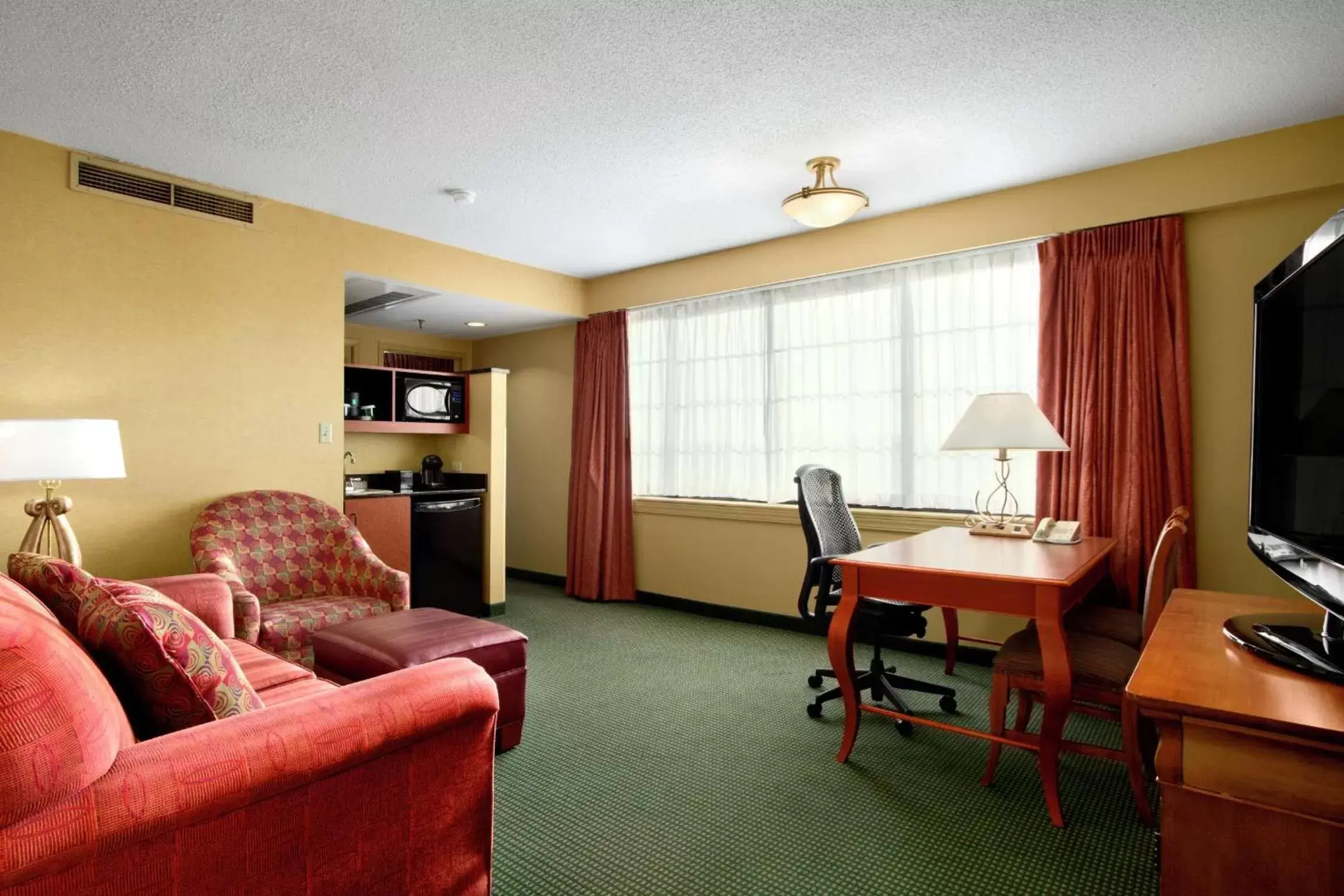 Two-Room Corner King Suite - Non-Smoking in Embassy Suites by Hilton Greensboro Airport Two-Room Corner King Suite - Non-Smoking in Embassy Suites by Hilton Greensboro Airport