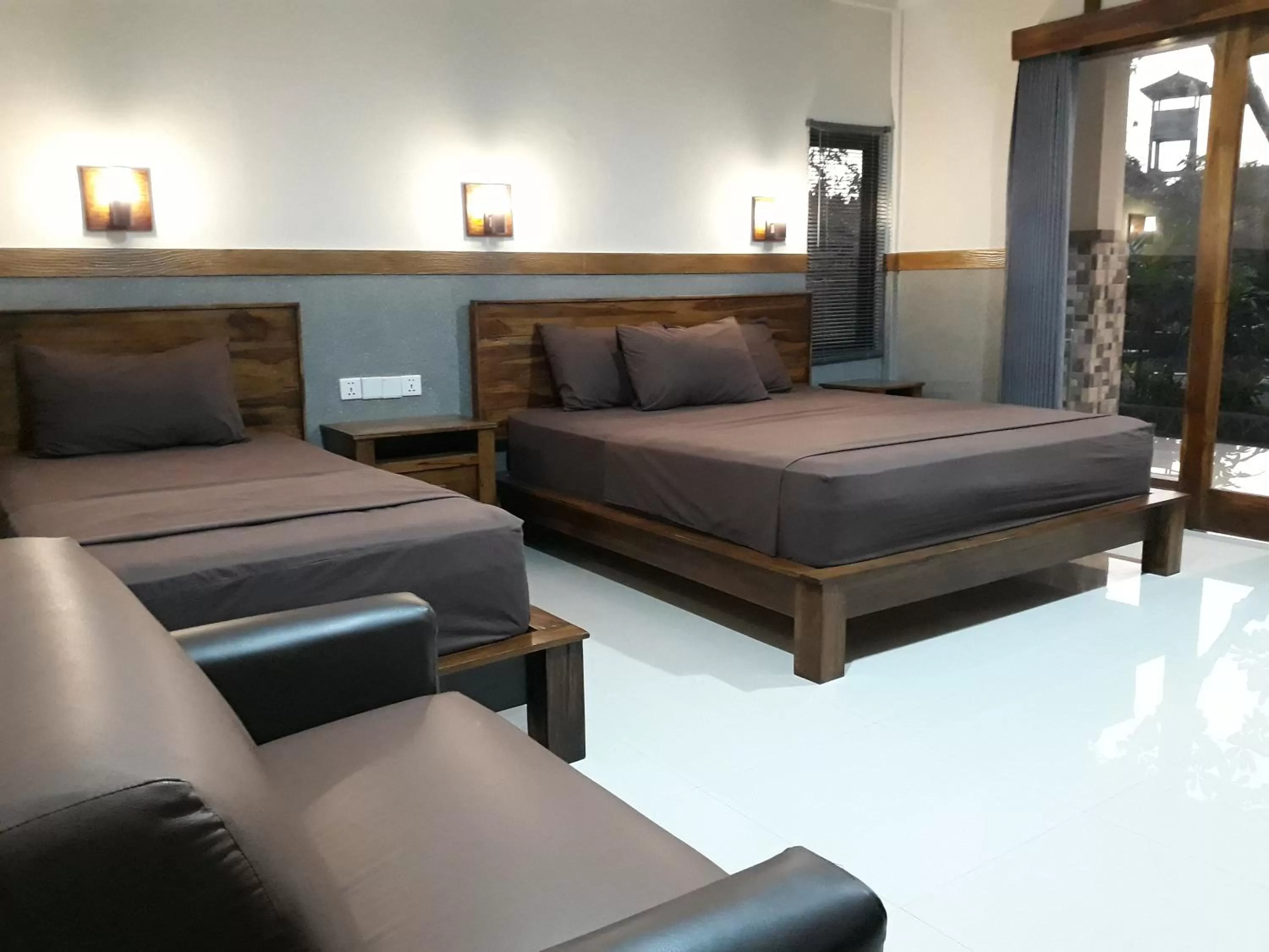 Deluxe Triple Room in Puri Bali Hotel