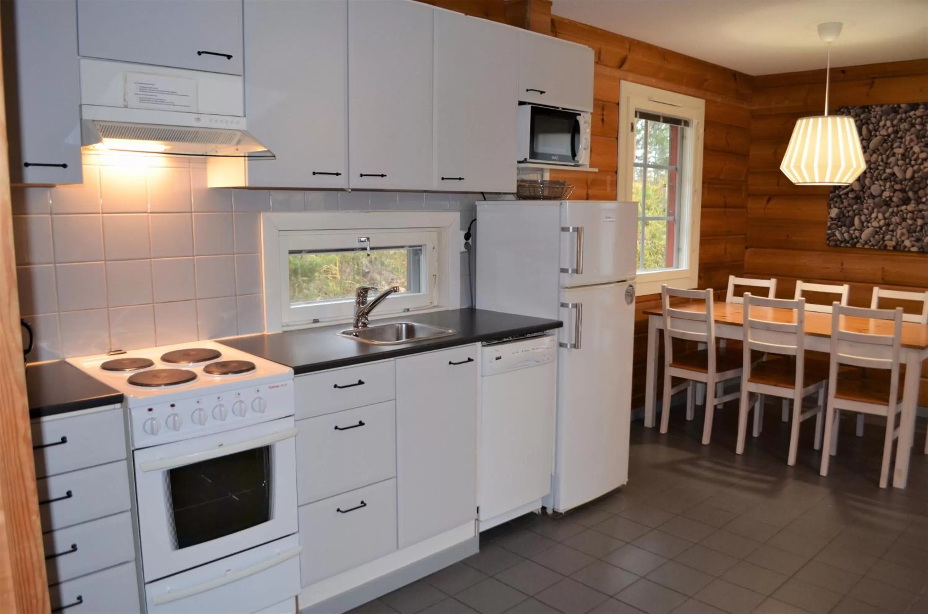 Kitchen or kitchenette in Rauhalahti Holiday Homes