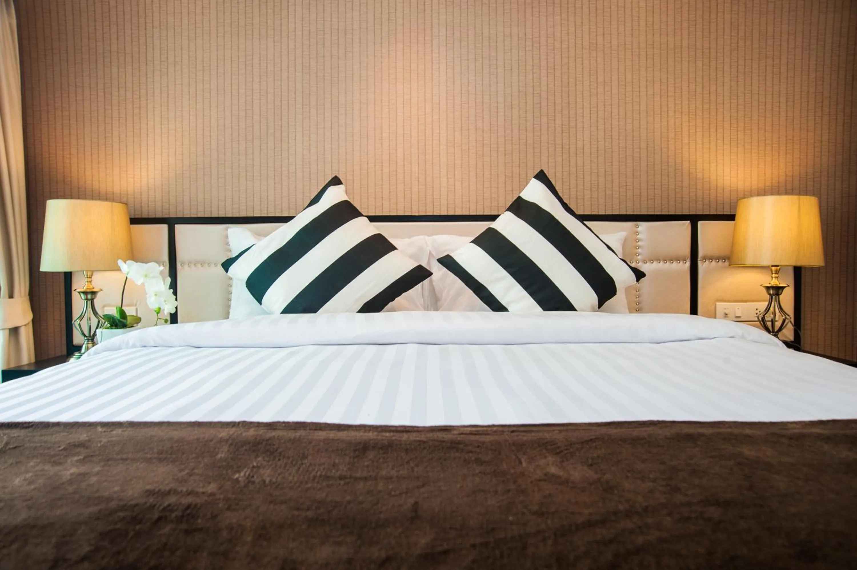 Bed in The Title KR Beach Condotel Rawai Beach