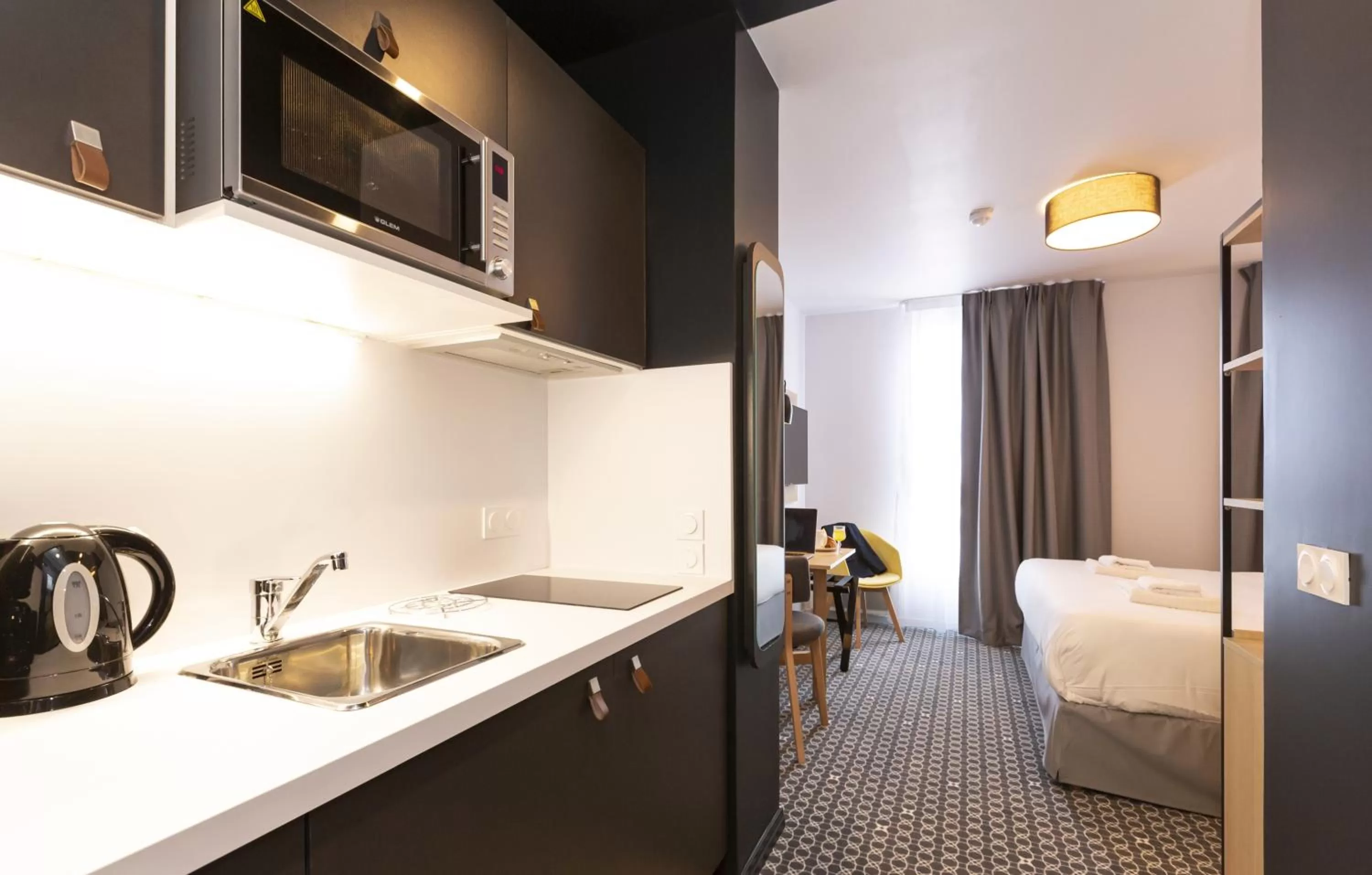 Kitchen or kitchenette, Bed in Appart Hotel Odalys City Le Havre Centre Les Docks