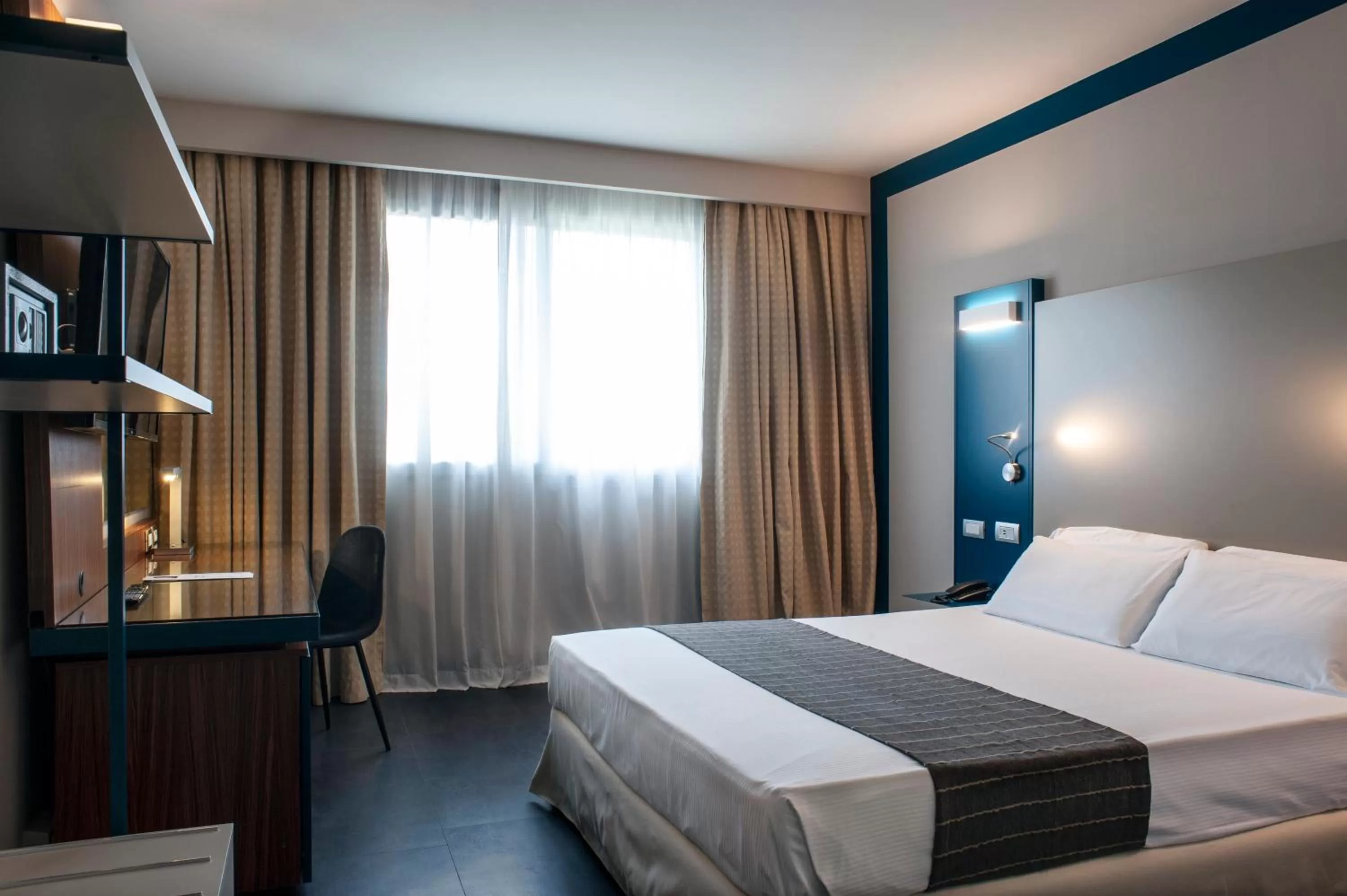 Bedroom, Bed in La Meridiana Bleisure Hotel