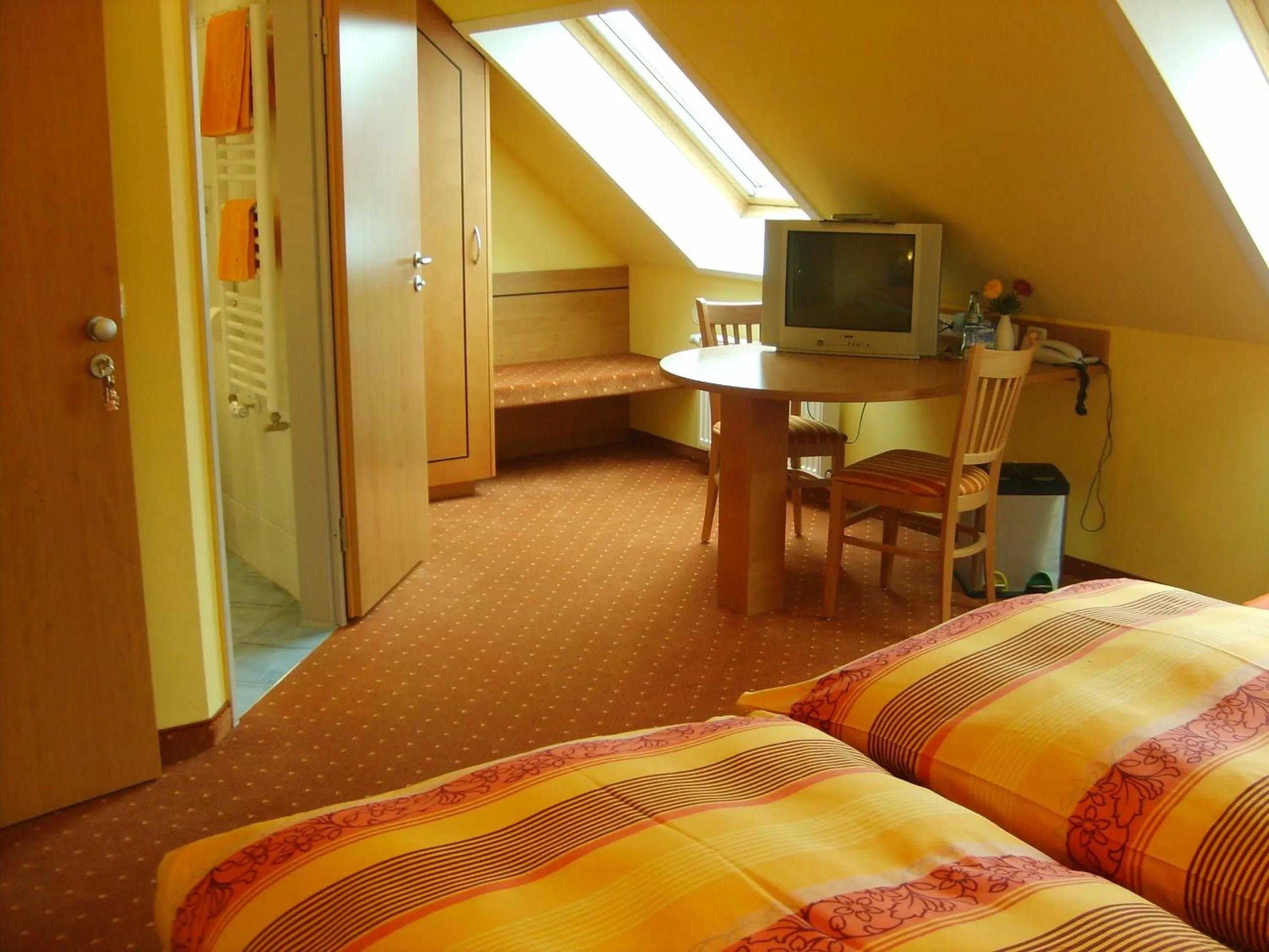 Photo of the whole room, Bed in BIO Hotel Bayerischer Wirt Augsburg