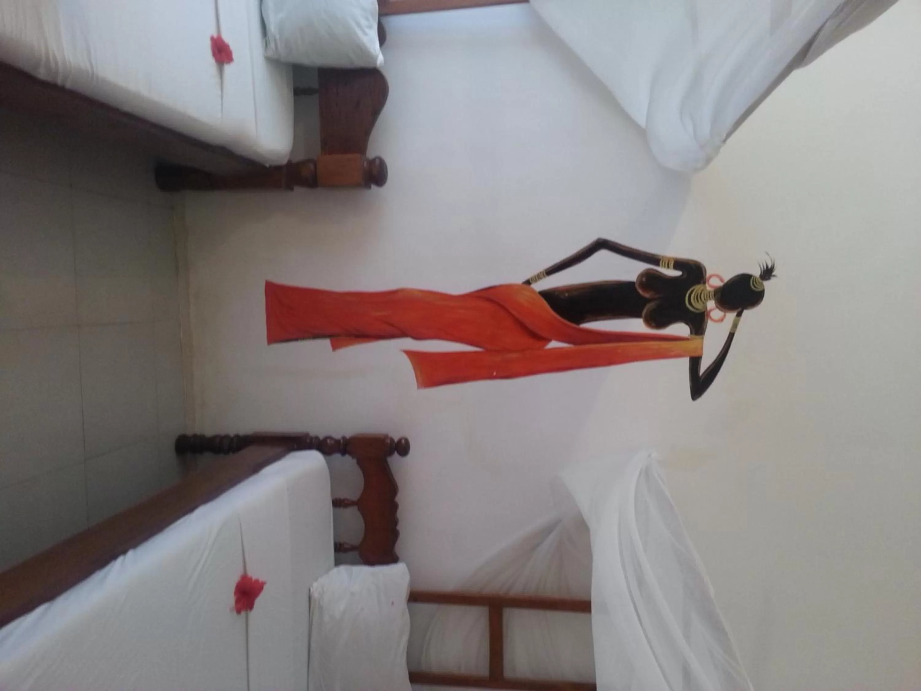 Decorative detail, Bed in Ebony & Ivory Beach Bungalows