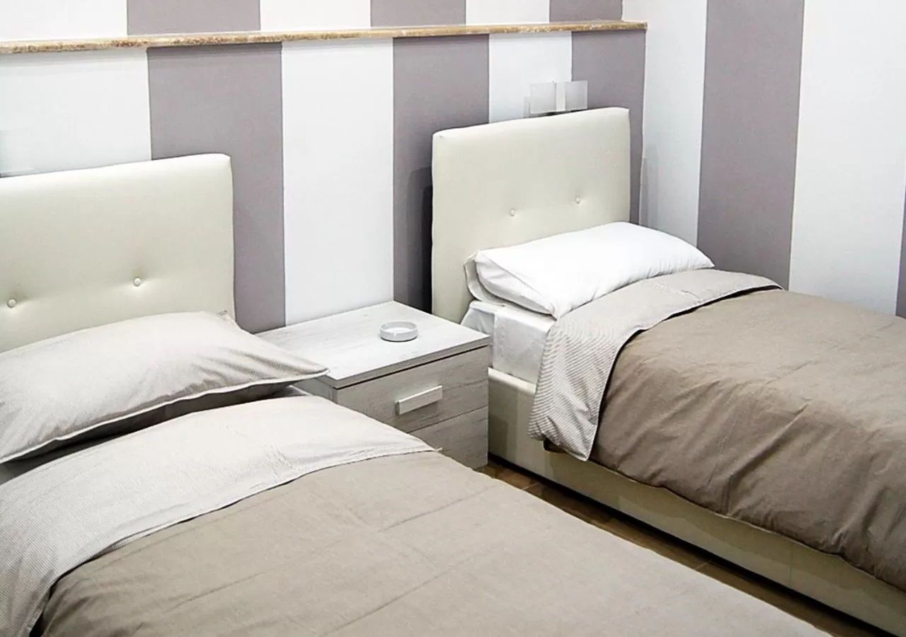 Bed in B&b Vittorio Emanuele II