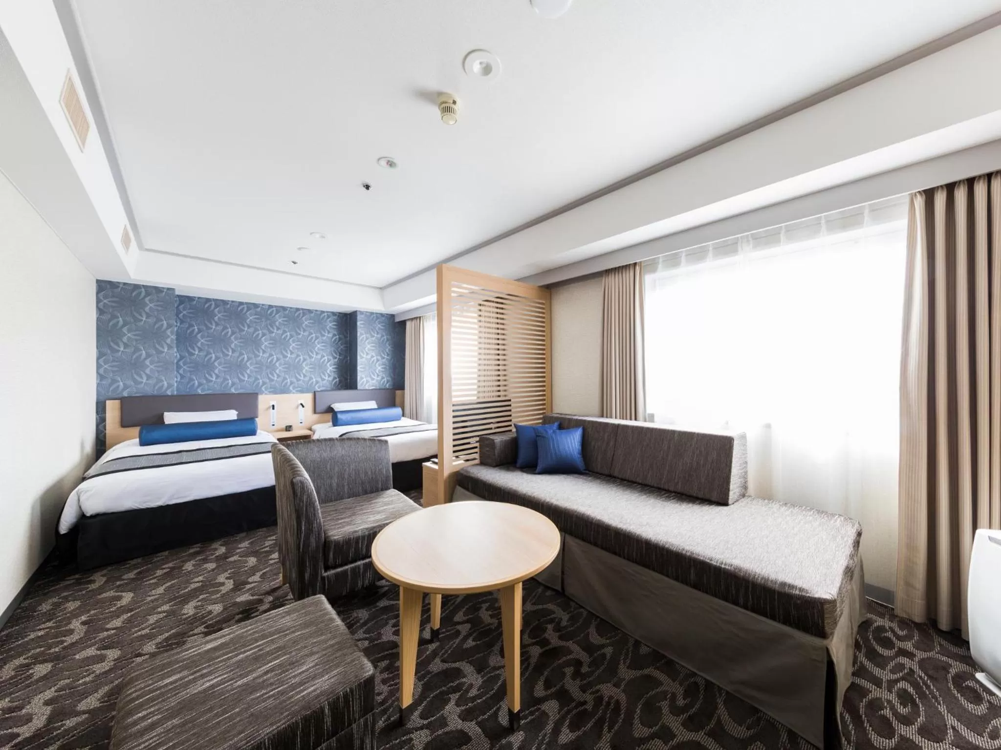 Photo of the whole room, Bed in Shin Osaka Esaka Tokyu REI Hotel
