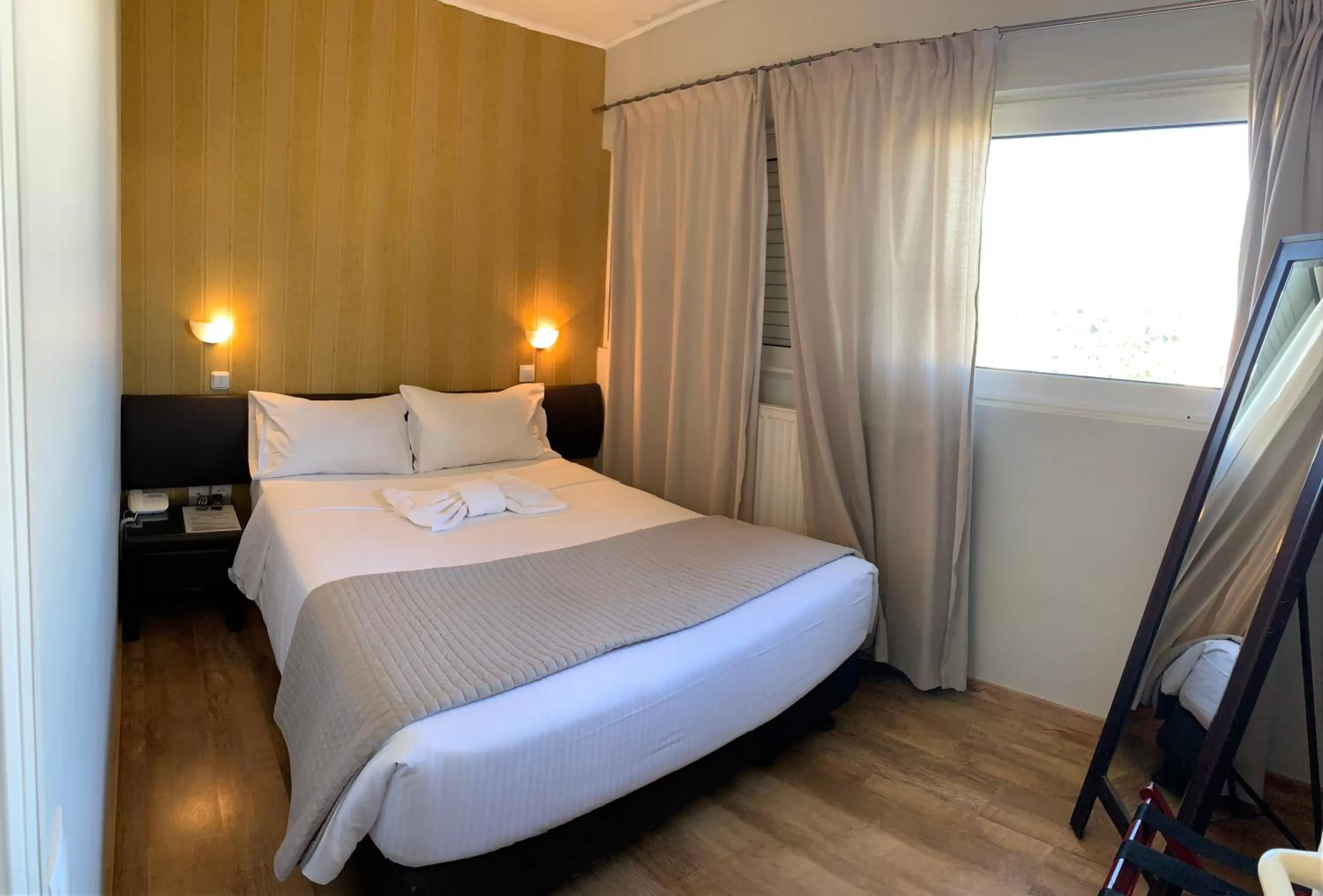 Bed in Rivitel Marousi Apartments