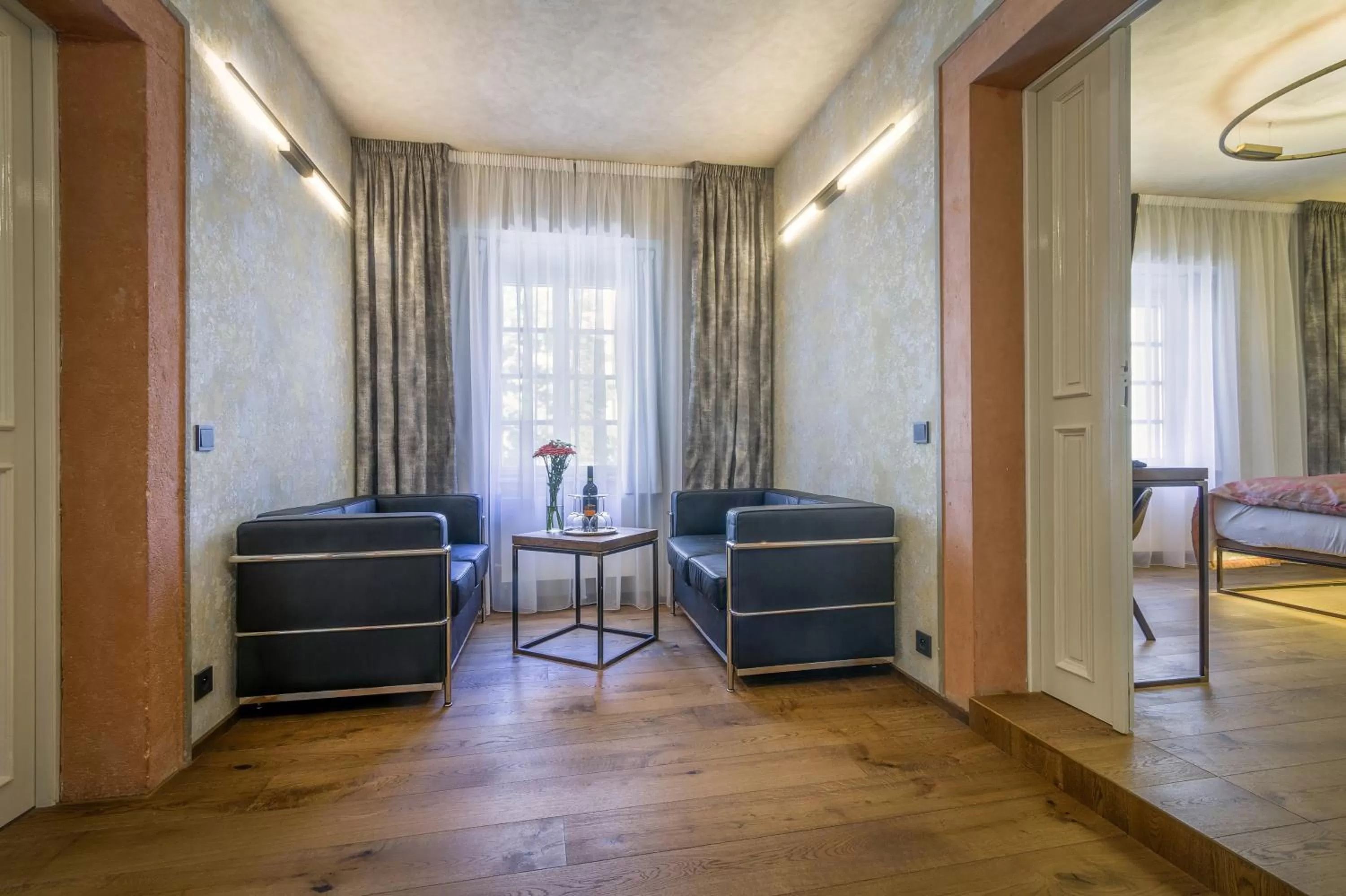 Seating area, Bed in Hotel Waldstein