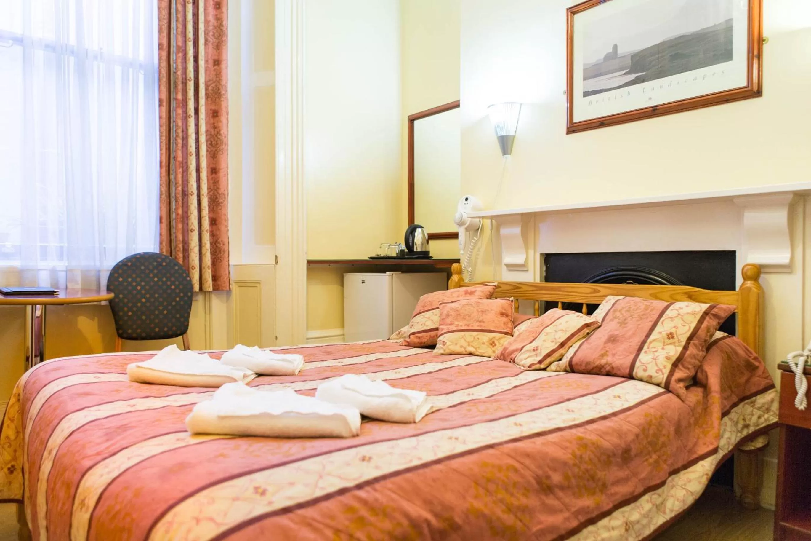 Bed in Shakespeare Hotel