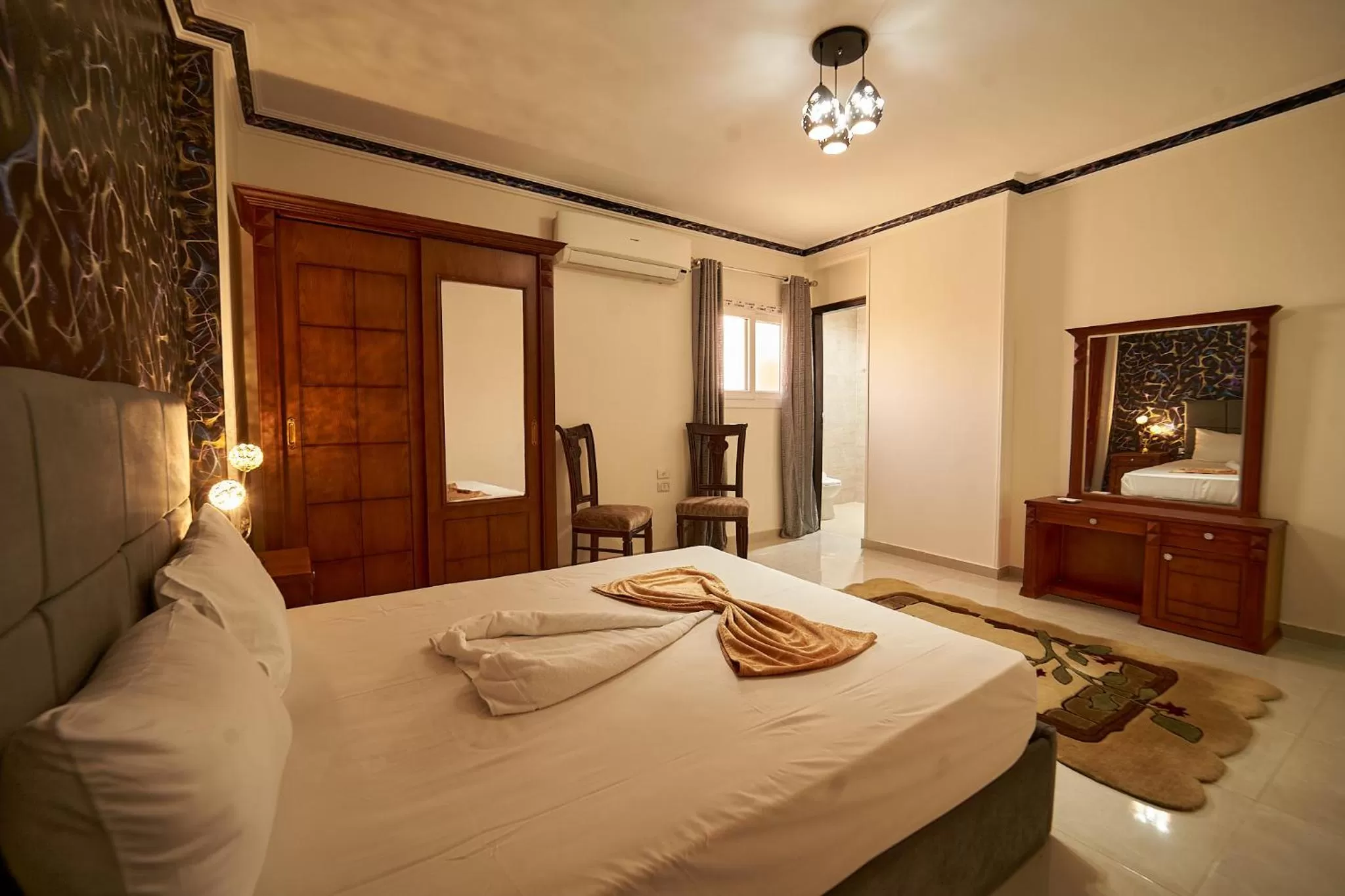 Bedroom, Bed in Gardenia Inn Hotel