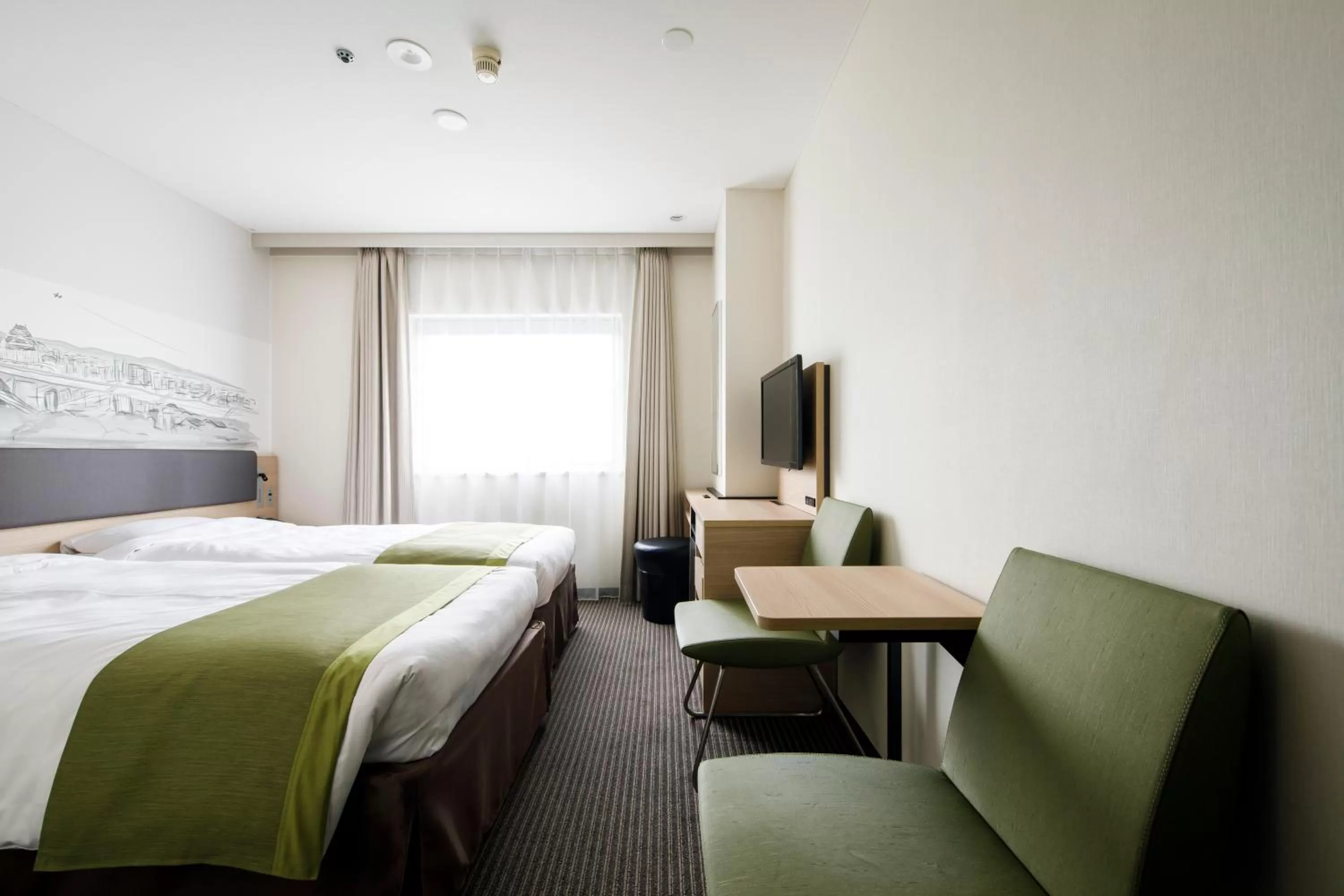 Photo of the whole room, Bed in Shin Osaka Esaka Tokyu REI Hotel