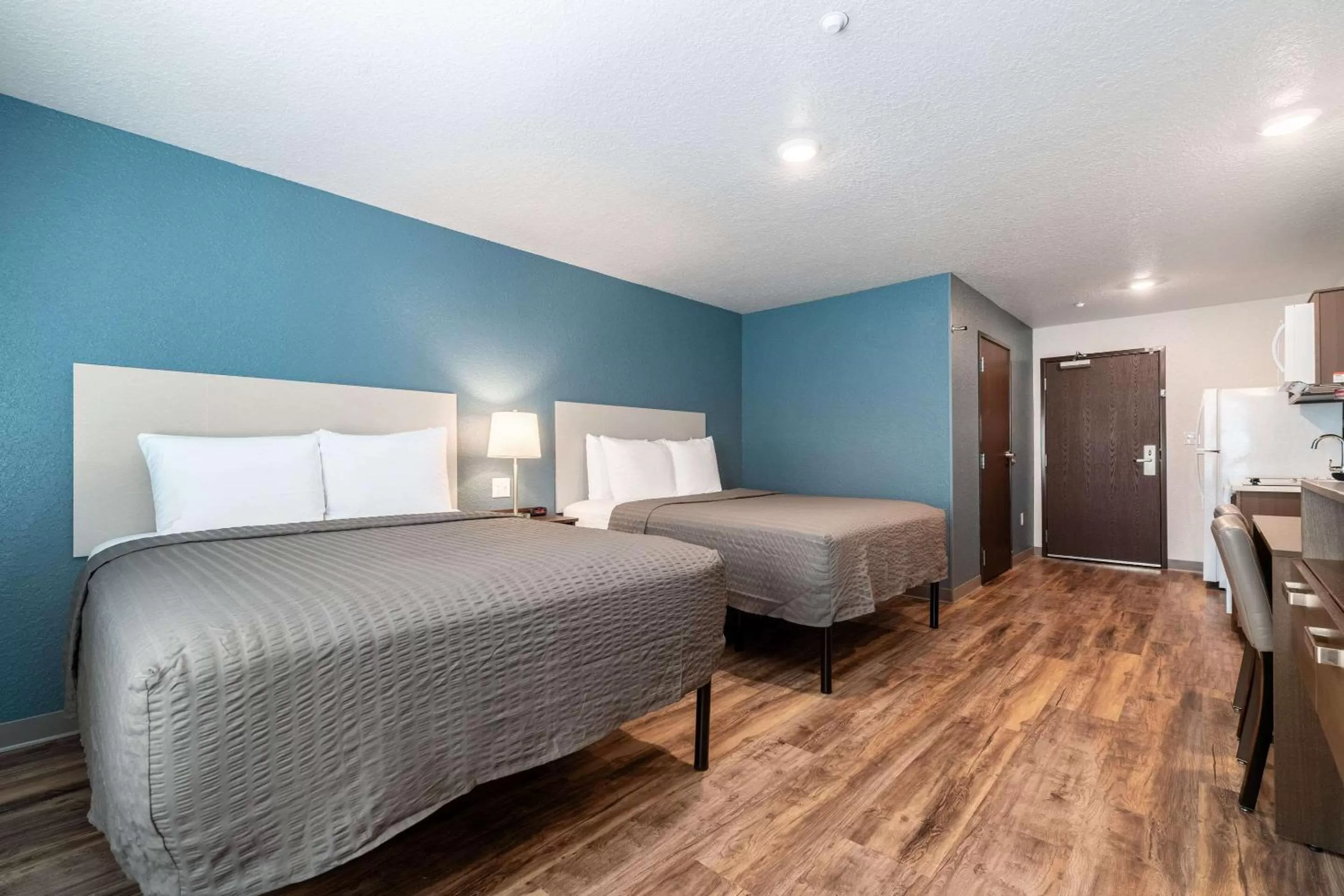 Photo of the whole room, Bed in WoodSpring Suites Sanford North I-4 Orlando Area