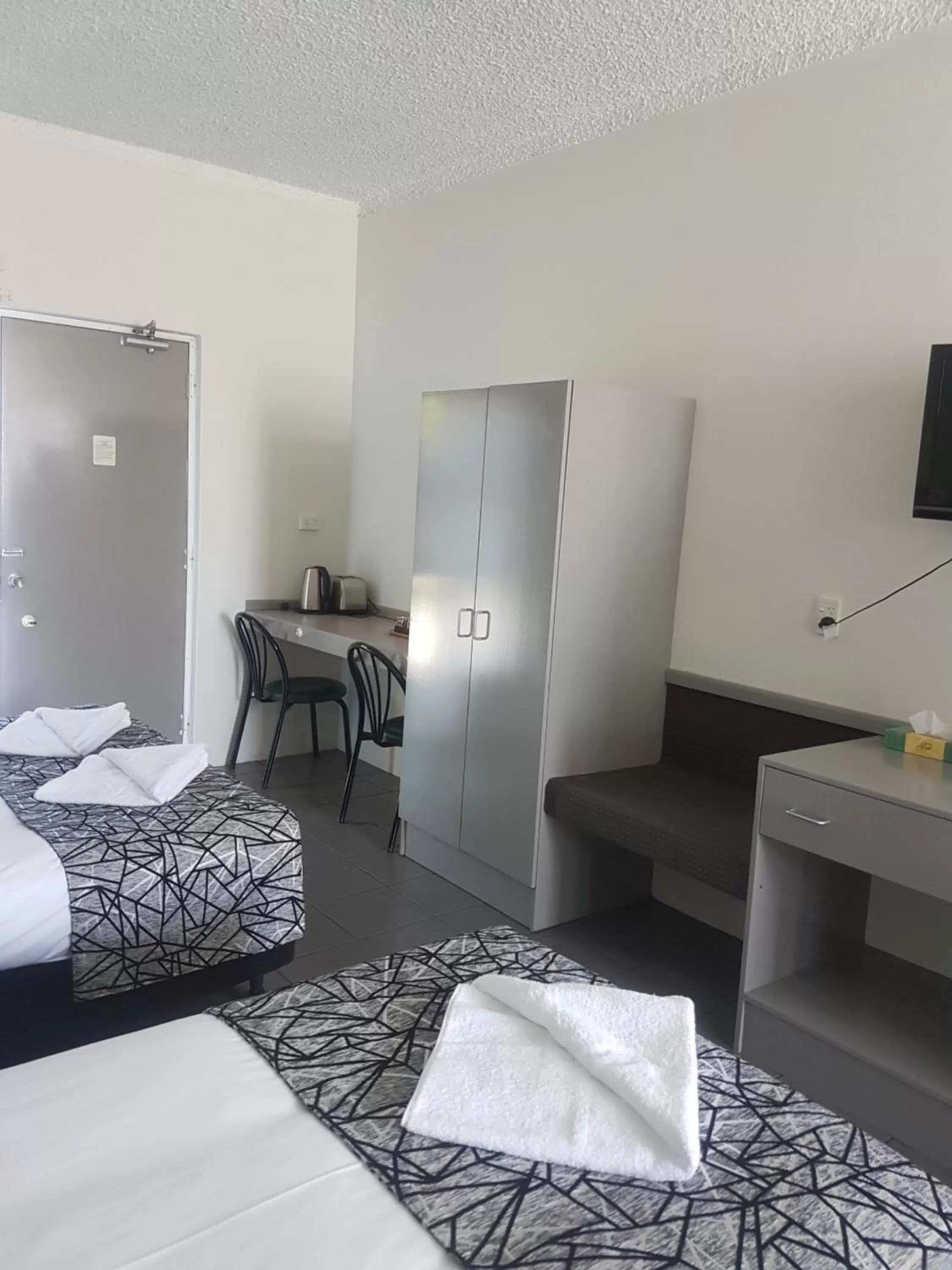 Bed in Park Drive Motel