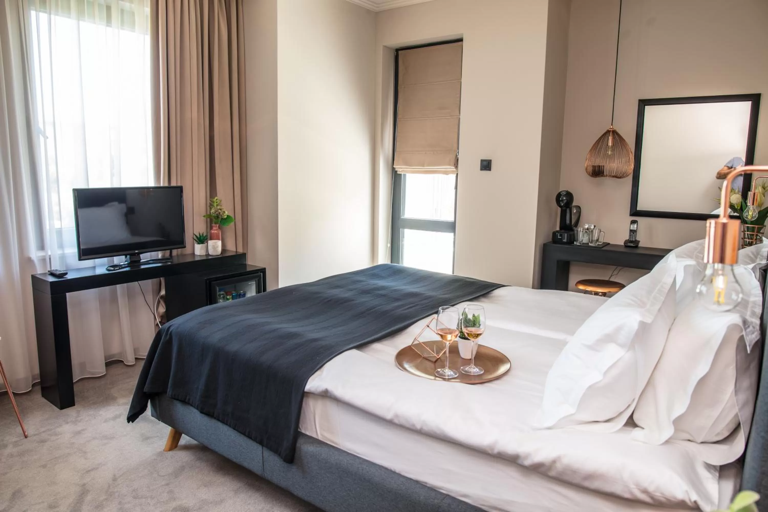 Bed in Reverence Boutique Hotel