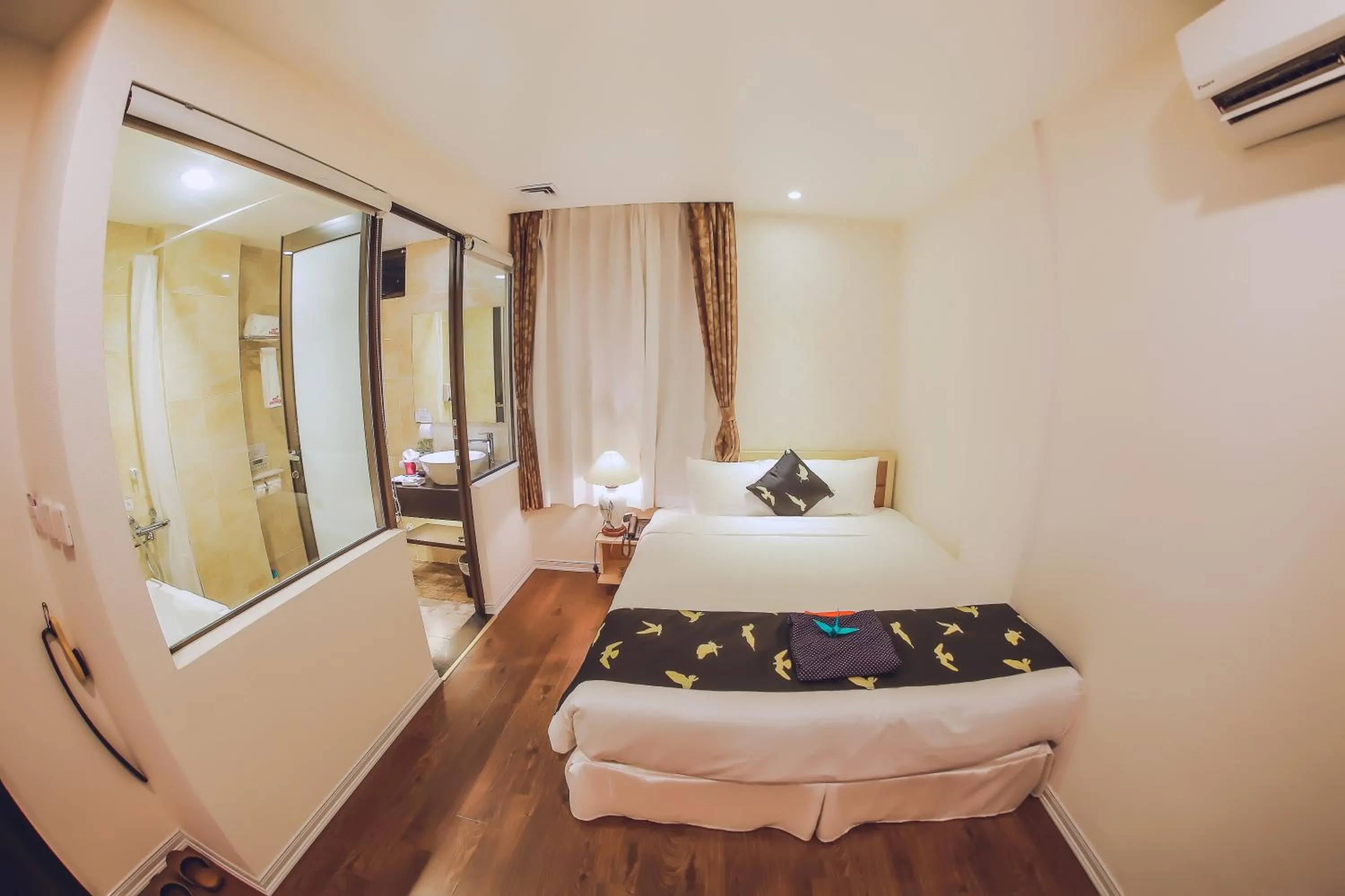 Bed in Momizi Business Hotel