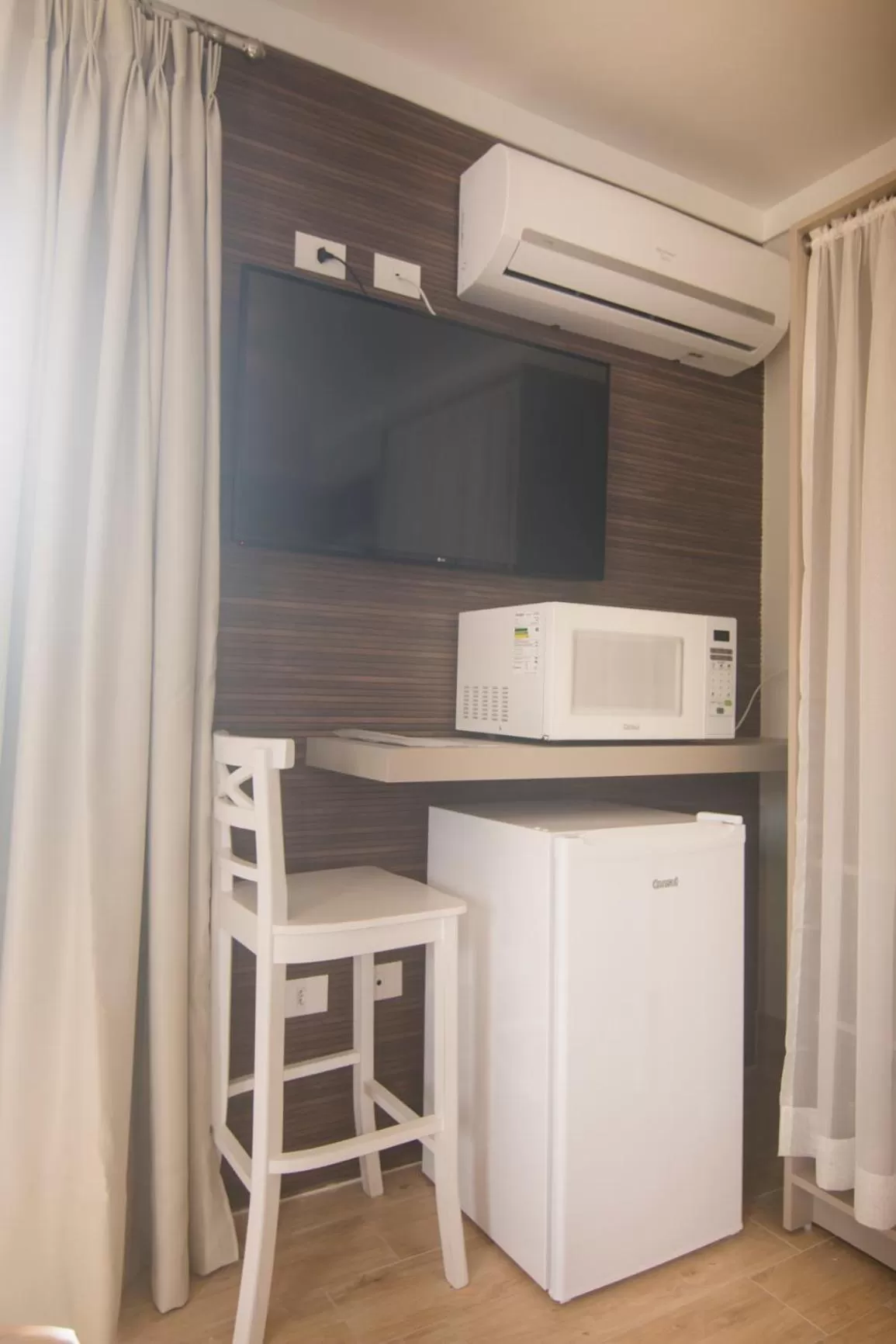 Property building, TV/Entertainment Center in Pousada Villa Di Enzo