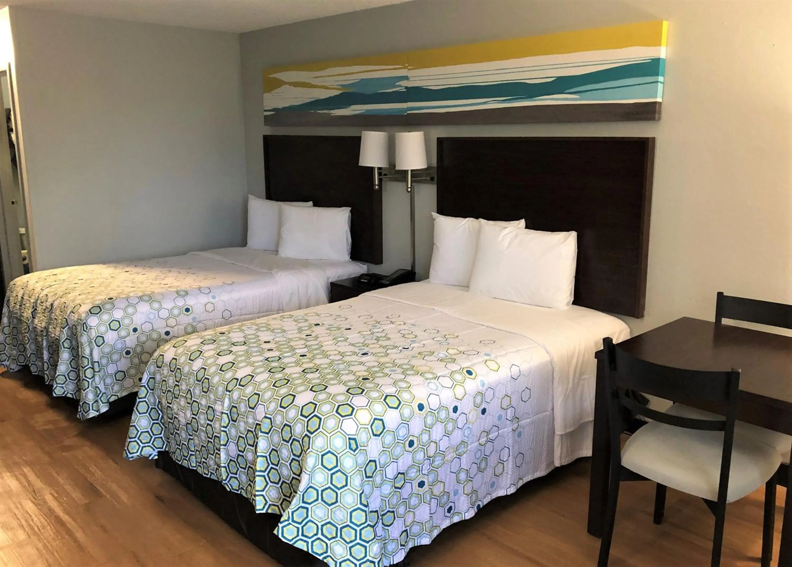 Bedroom, Bed in HomeTowne Studios by Red Roof Augusta