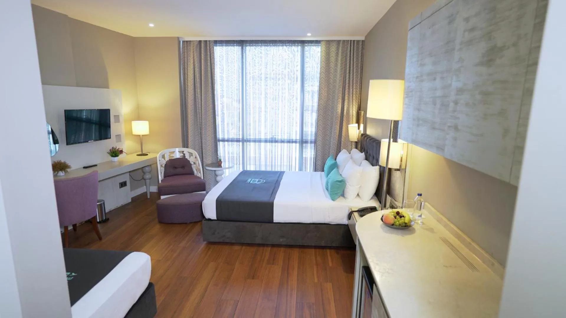 Bed in Homey AirPort Hotel