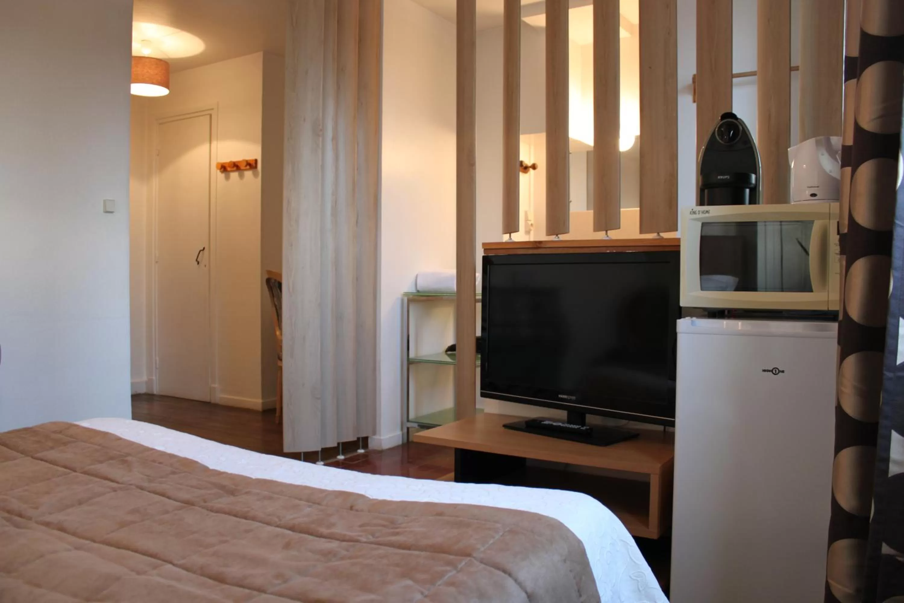 TV/Entertainment Center in Résidence et Chambres d'Hôtes de La Porte d'Arras