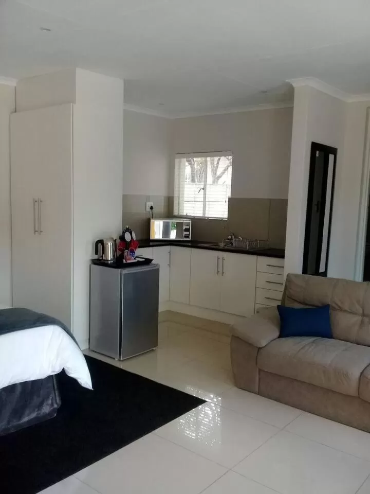 Kitchen or kitchenette in Apollo Hotel