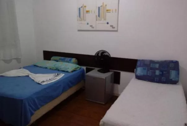 Bed in Pousada Villas