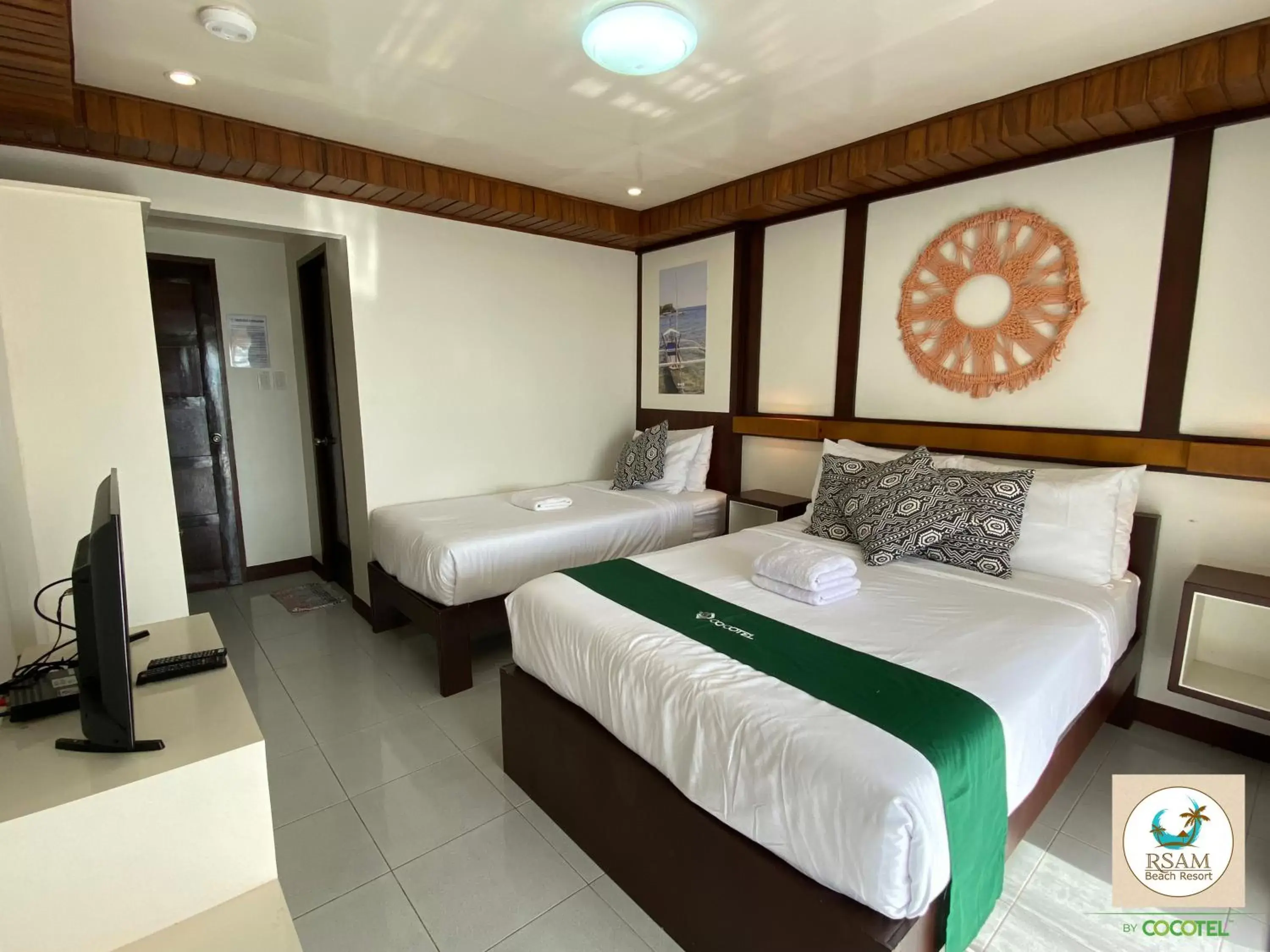 Deluxe Triple Room in RSAM Beach Resort by Cocotel Deluxe Triple Room in RSAM Beach Resort by Cocotel