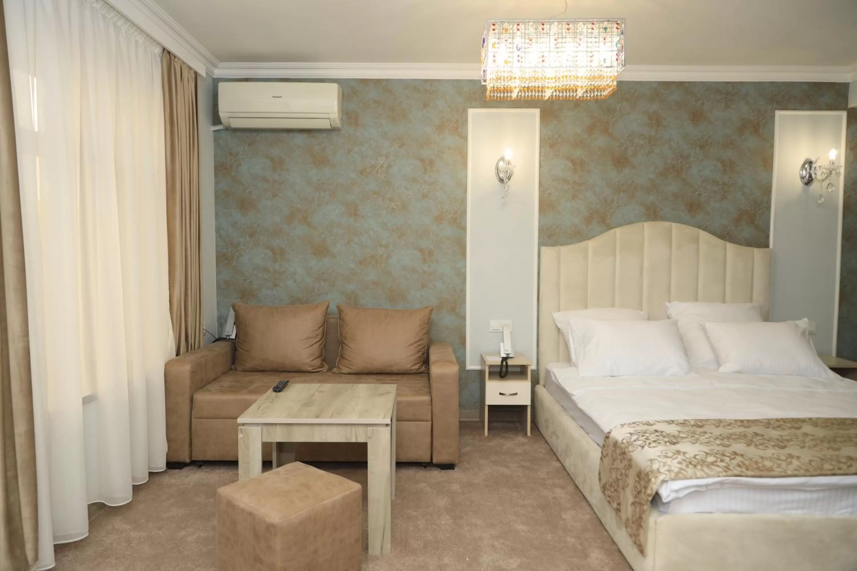 Bed in DeLin Hotel And Tours