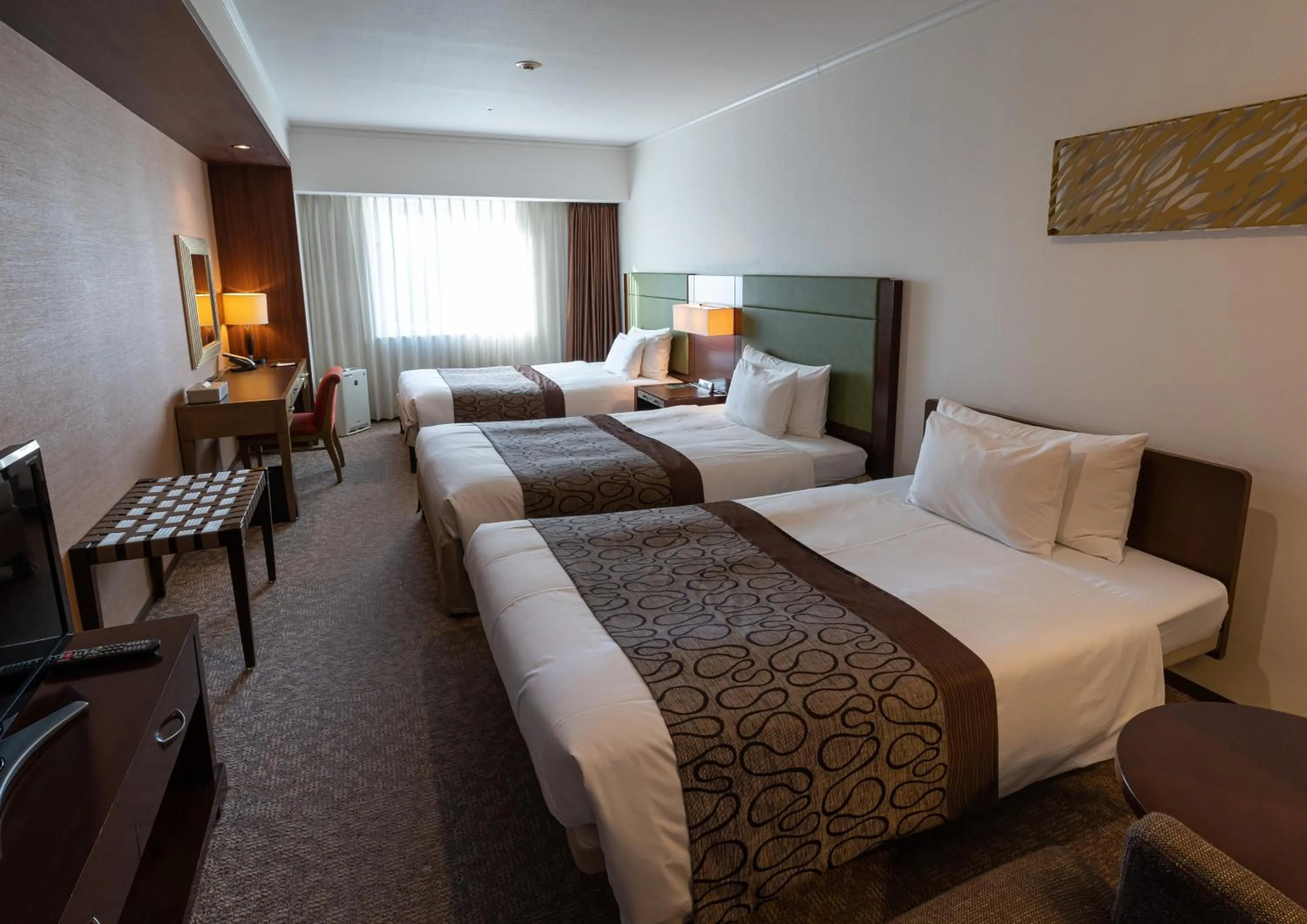 Bed in Ibis Styles Sapporo