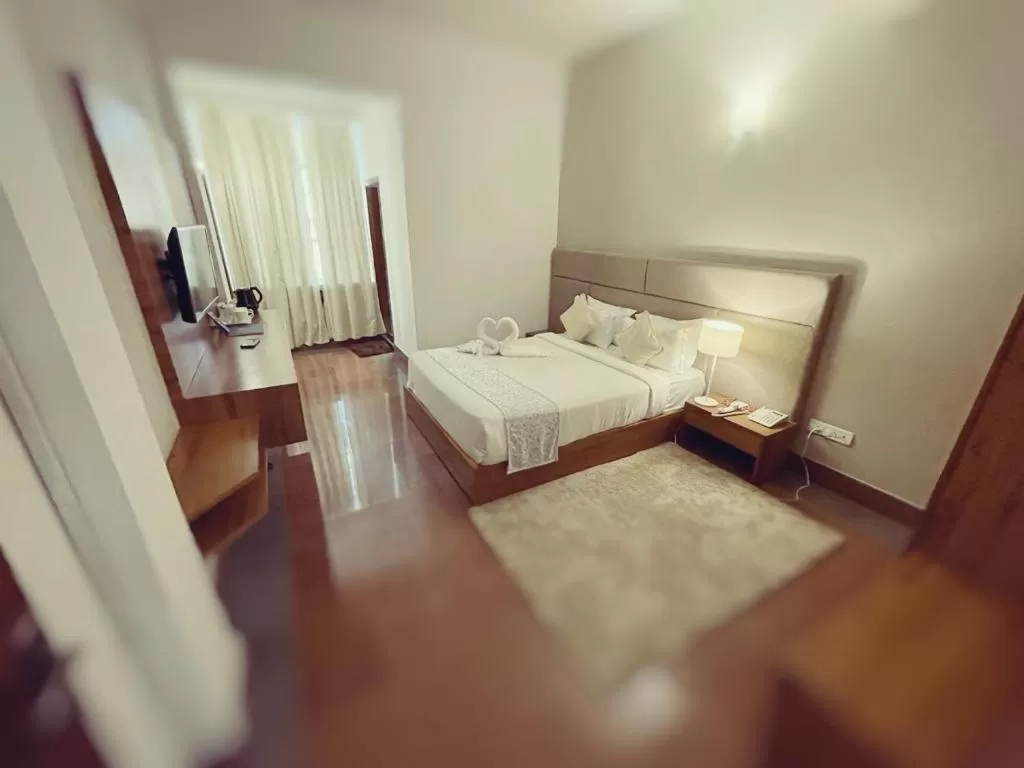 Bed in Hotel Tragopan