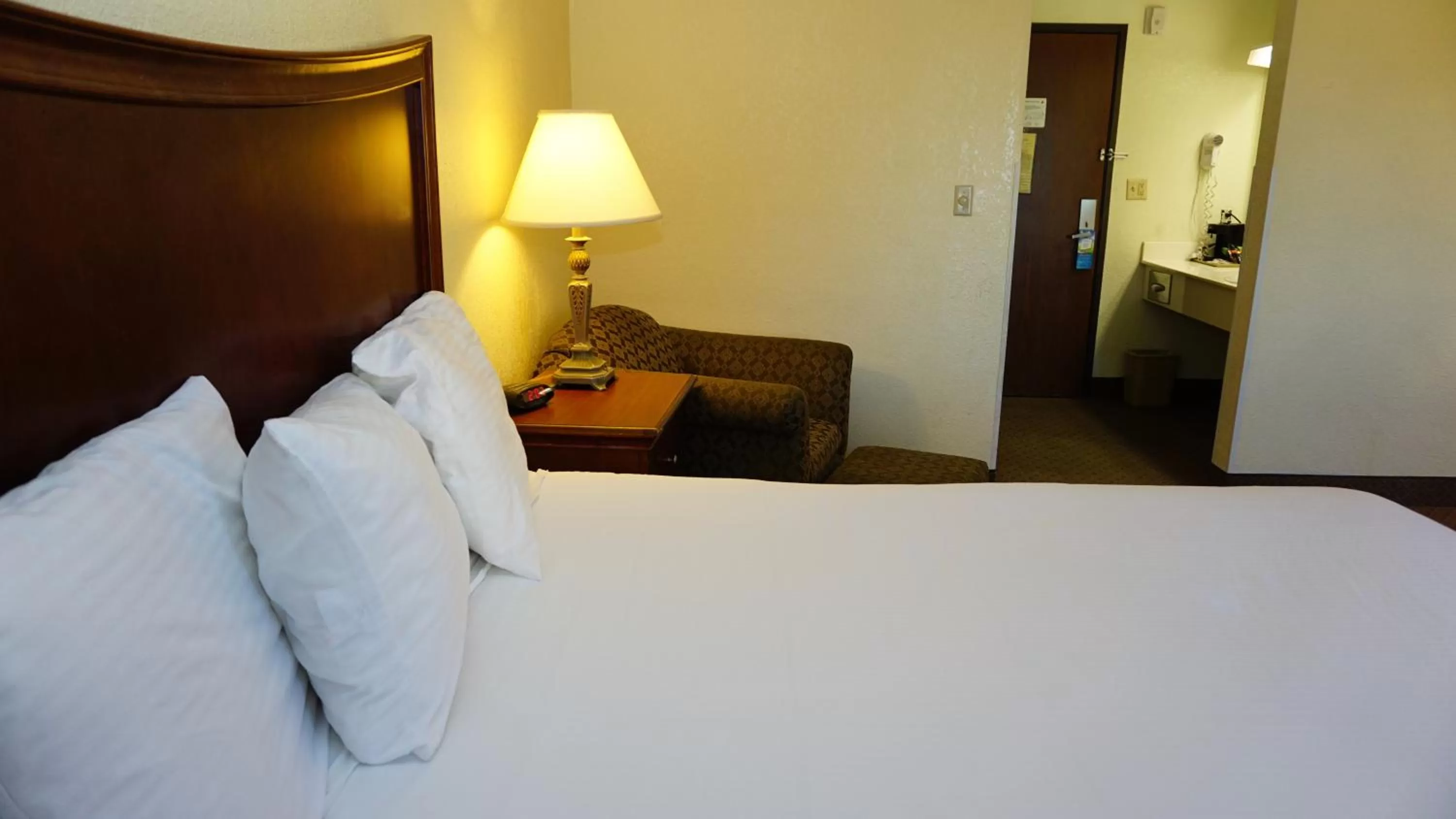 Decorative detail, Bed in Baymont by Wyndham Arlington At Six Flags Dr