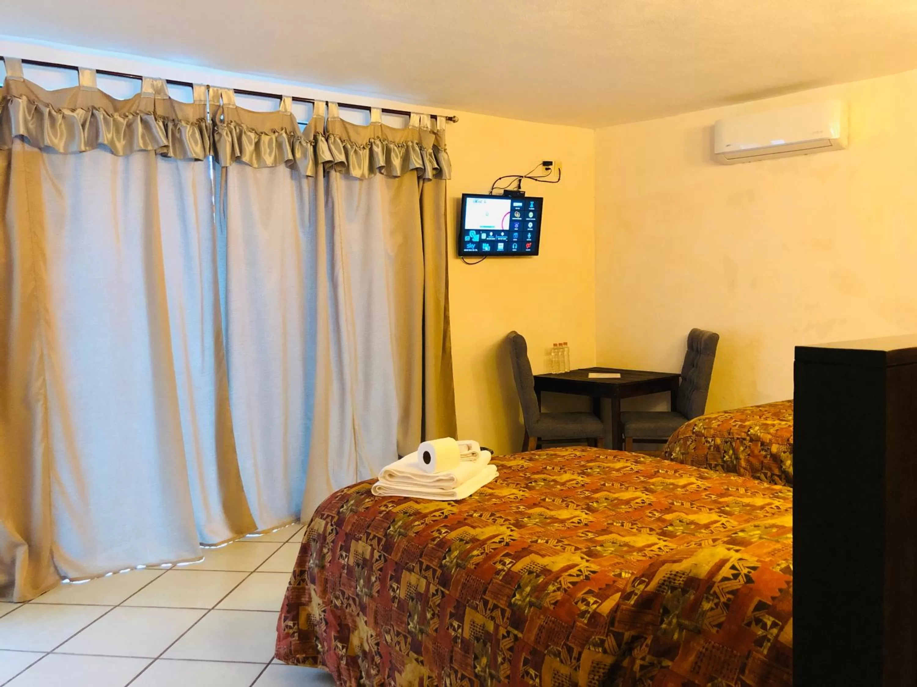 Bed in Hotel Camino Surreal Xilitla