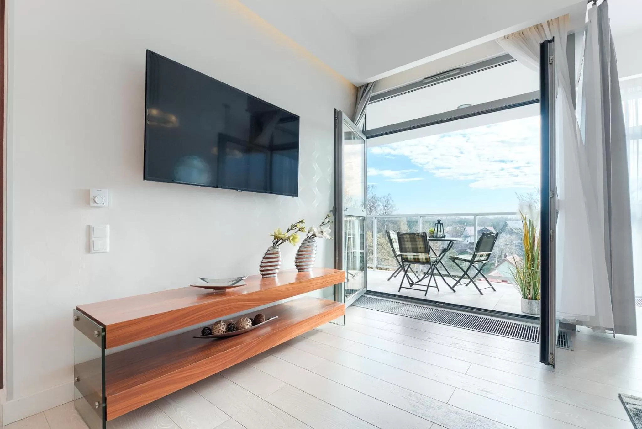 Communal lounge/ TV room, TV/Entertainment Center in Dune Resort Mielno - A