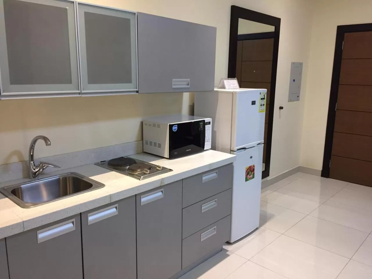 Kitchen/Kitchenette in Arjaan Altakhassusi Hotel Suites