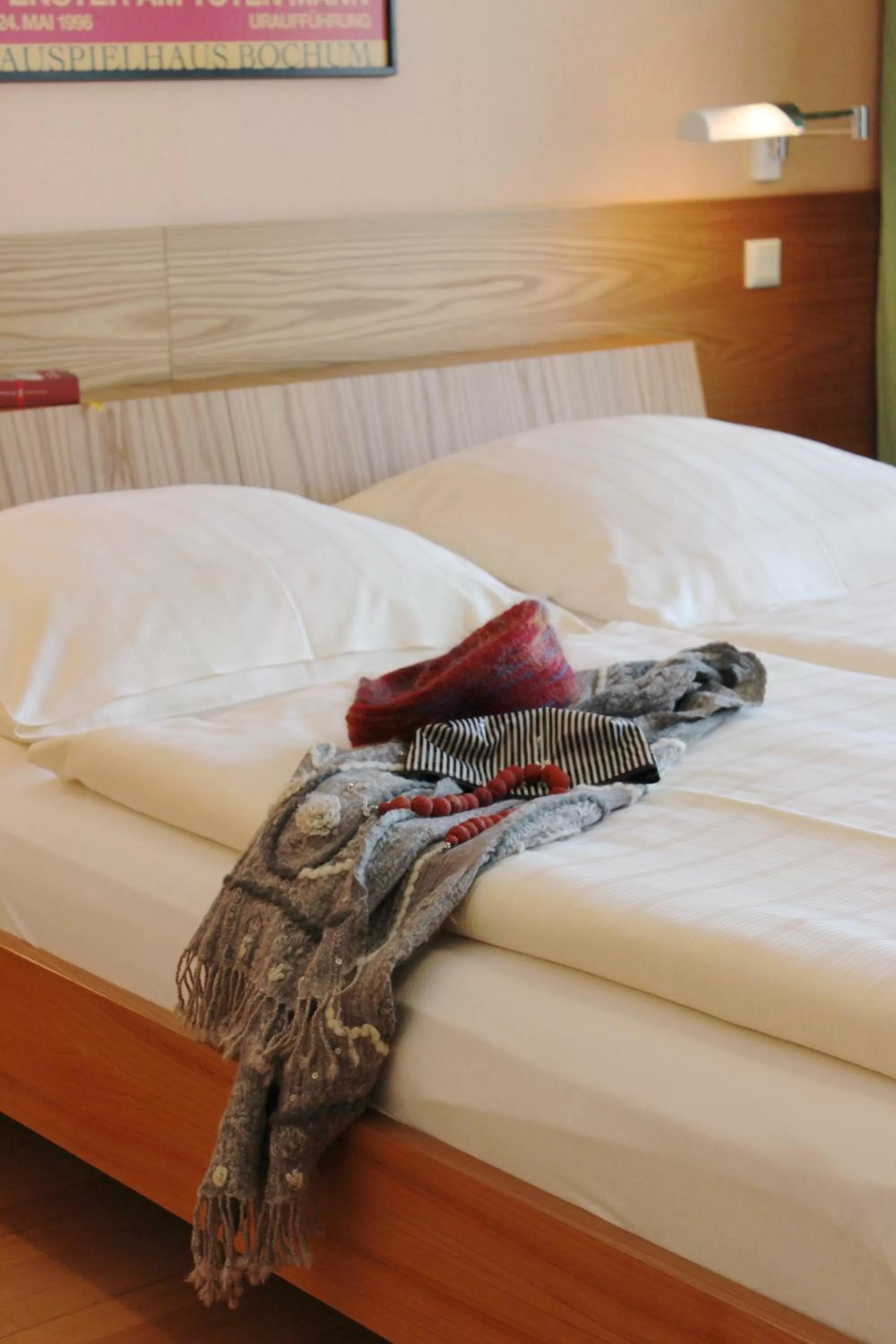 Bed in An der Persiluhr Stadt-gut-Hotel