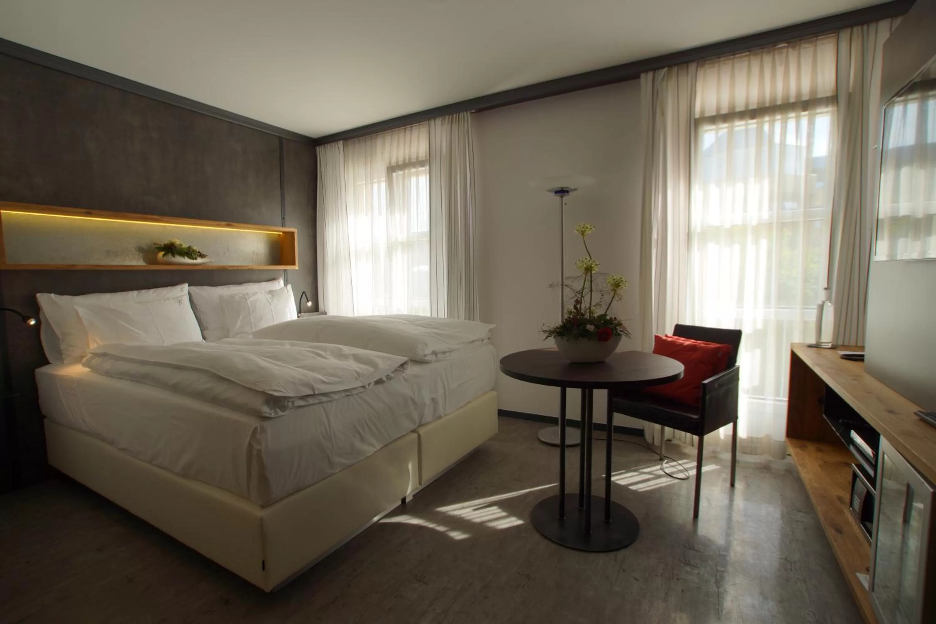 Bed in Boutiquehotel Thessoni Classic & Self service Residence Home Zürich