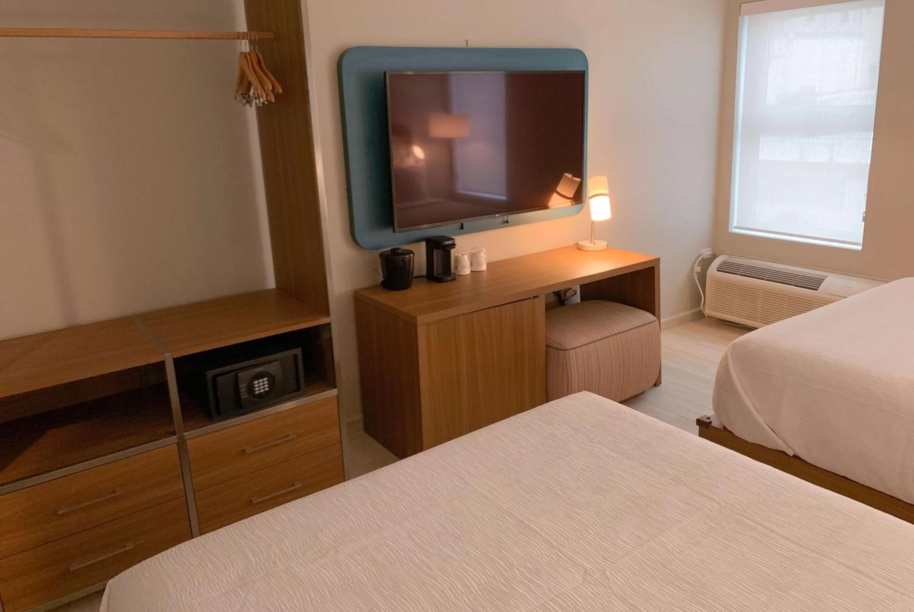 Photo of the whole room, TV/Entertainment Center in TRYP by Wyndham Mayaguez